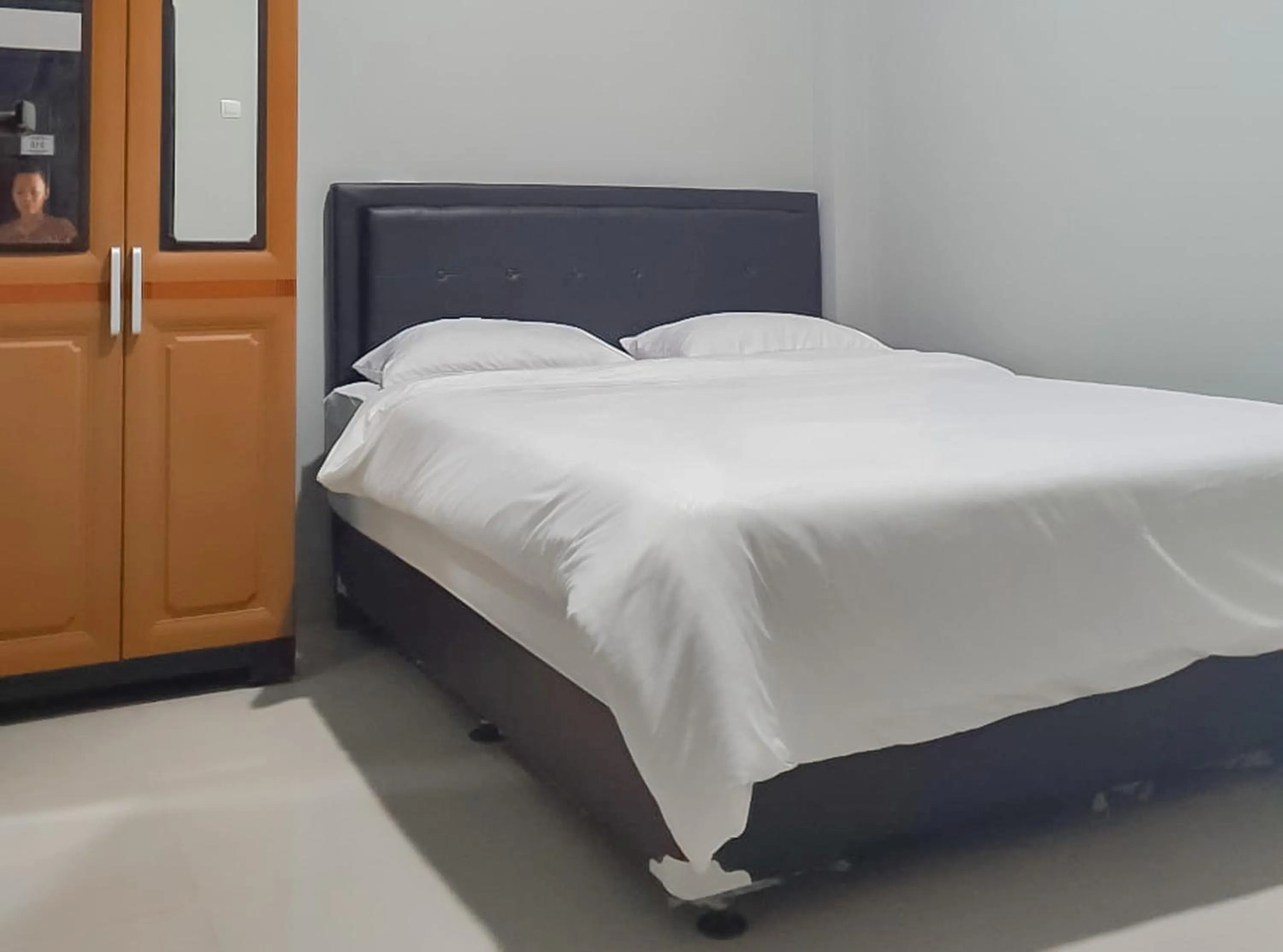 Bed in Bumi Ciboled Mitra RedDoorz near Gerbang Tol Pamulihan