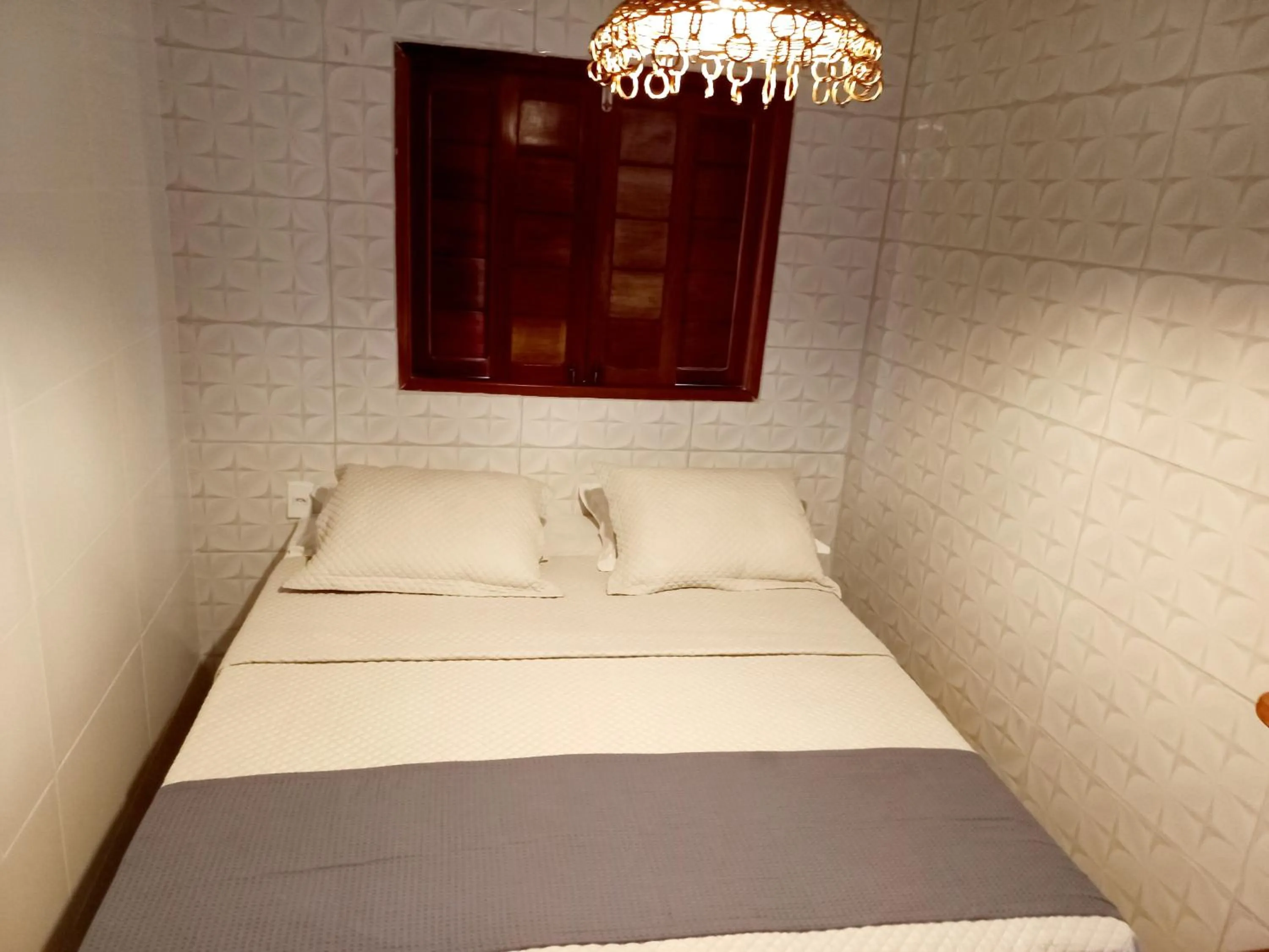 Bed in Chalé Palhano Beach