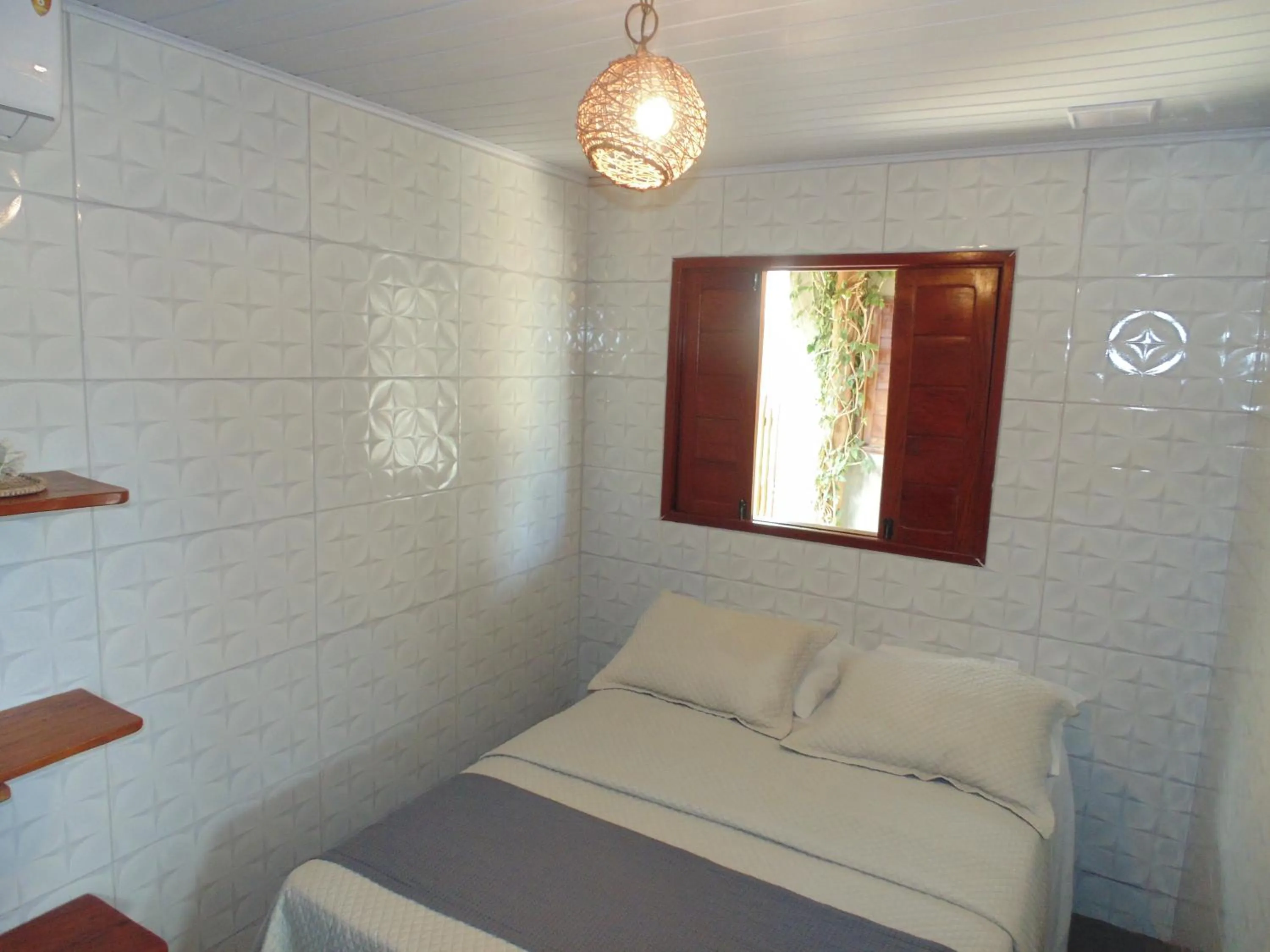 Bed in Chalé Palhano Beach