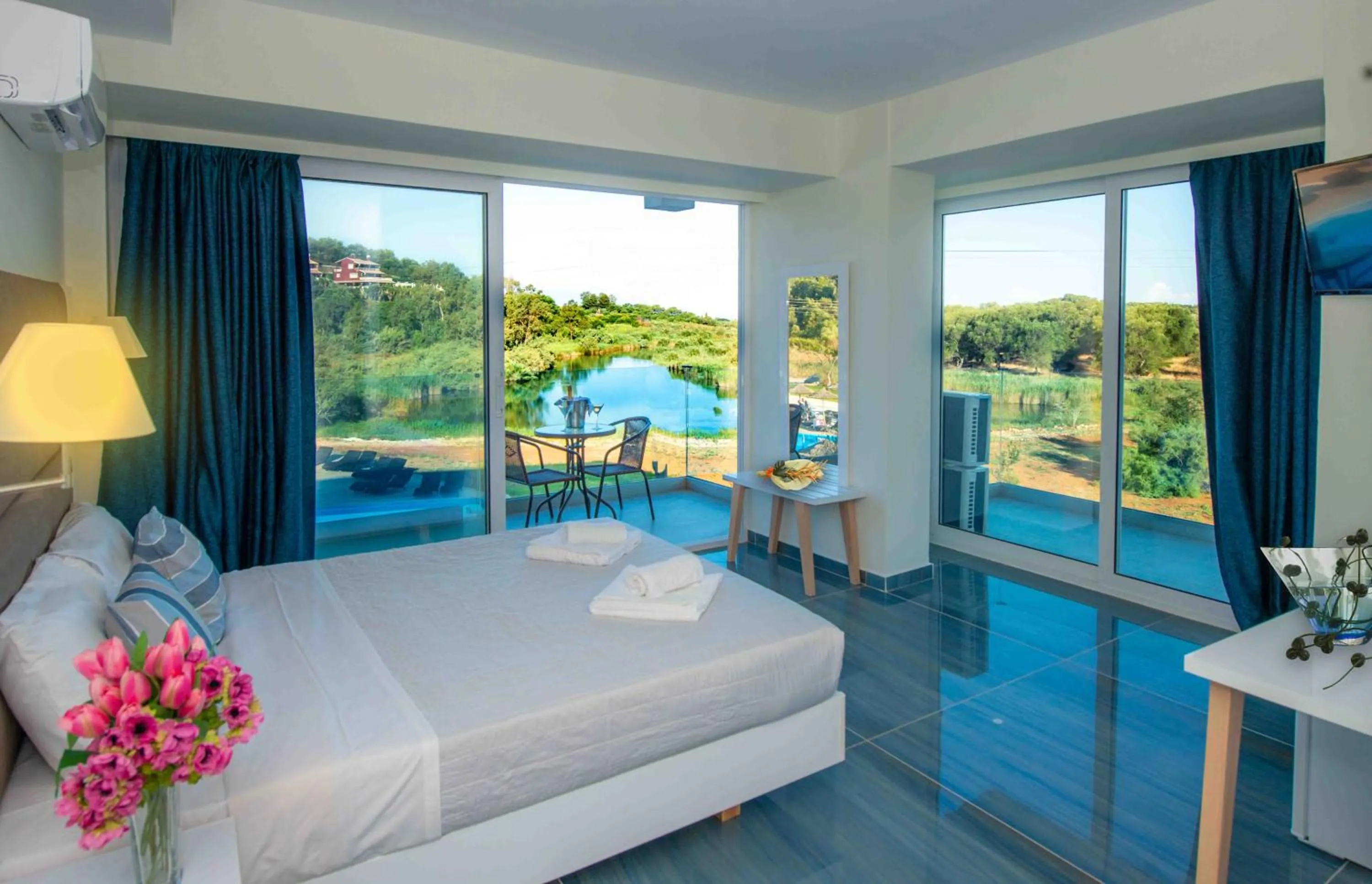 Pool view, Bed in LAGUNA HOLIDAY RESORT