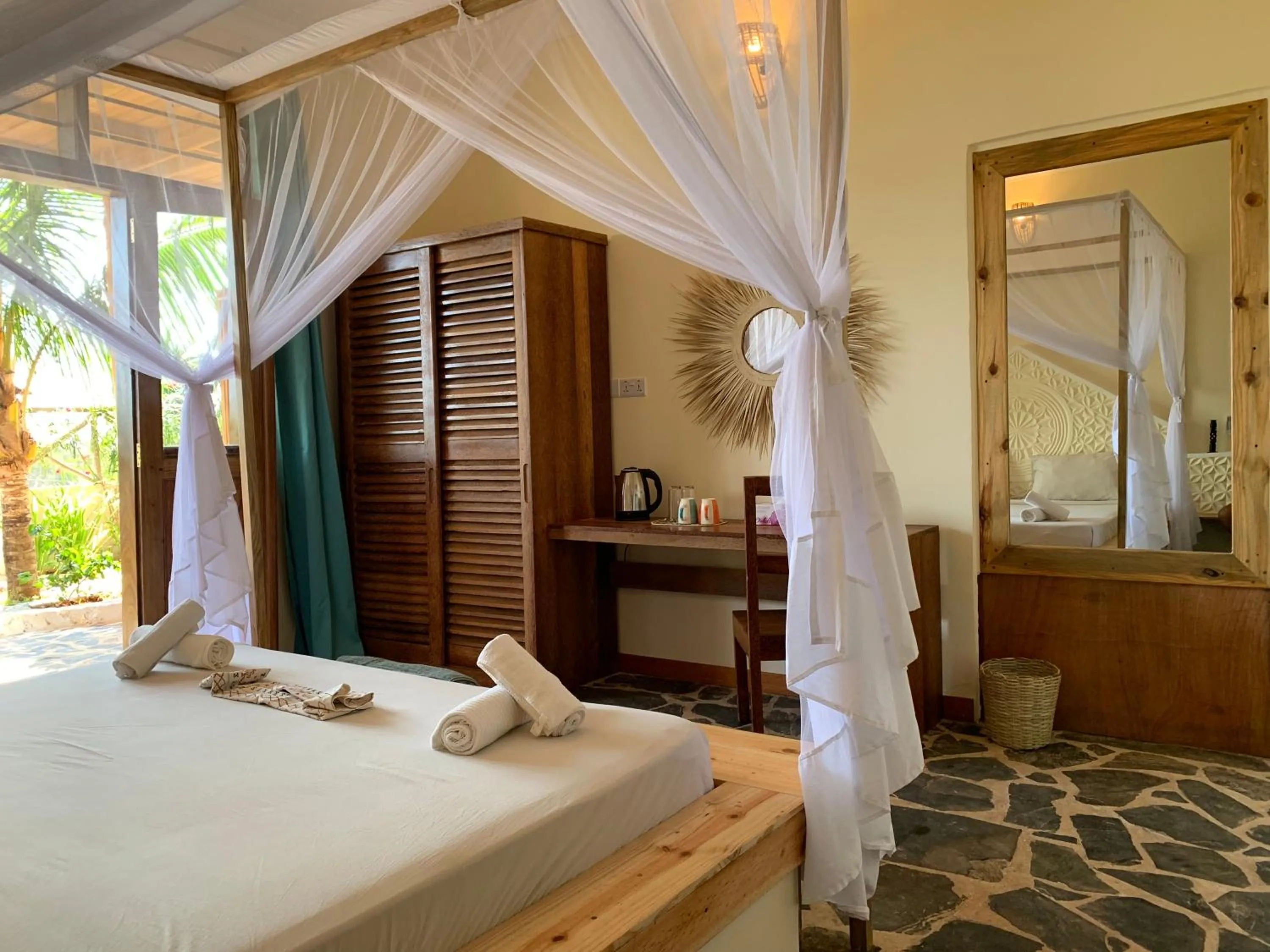 Photo of the whole room, Bed in Zanzibar Tropical Sunset Boutique Hotel - Adults Only