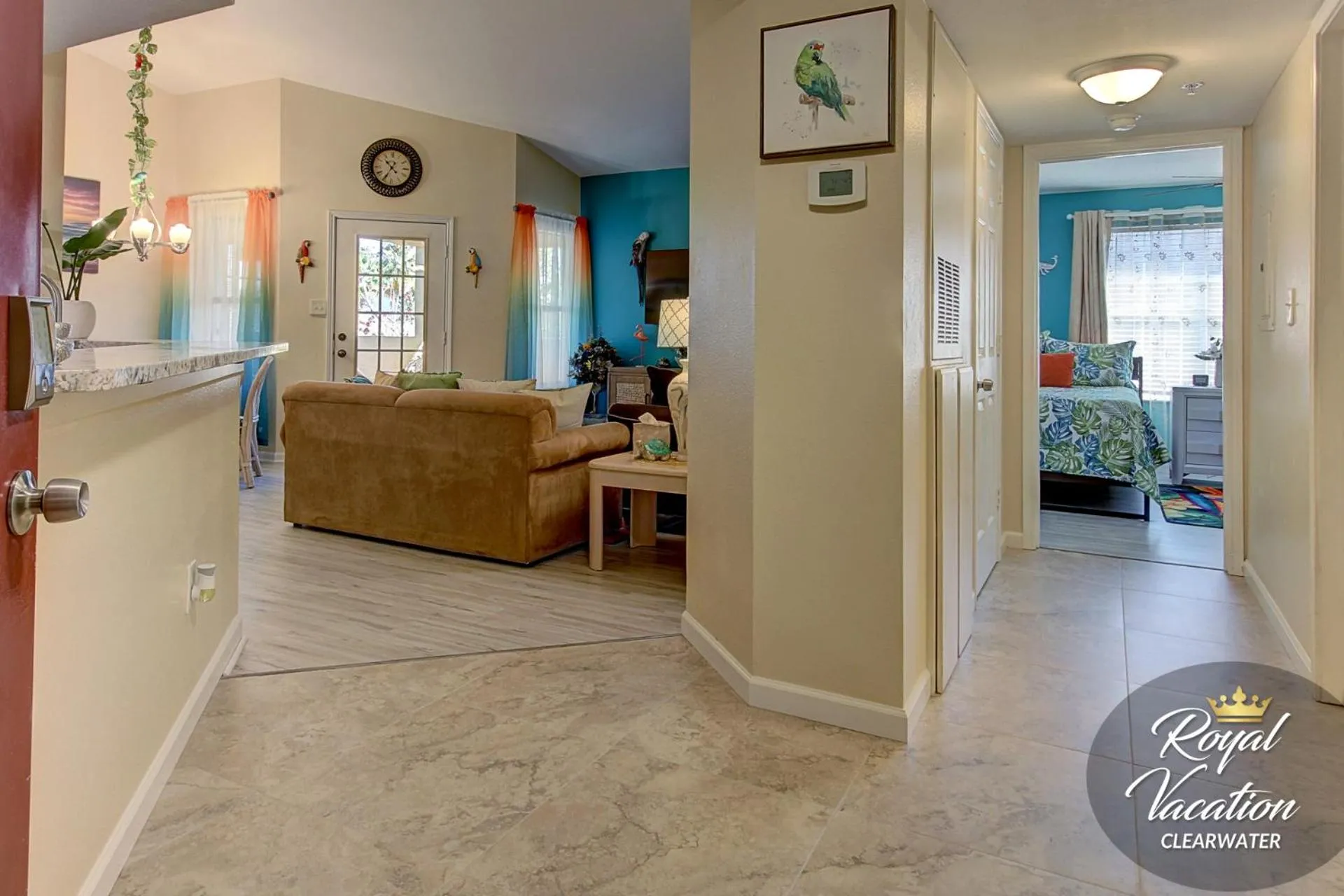 Living room, Bed in Royal Tropical at Avalon Clearwater - Pool & Free Parking - 10 Min Drive to Clearwater Beach