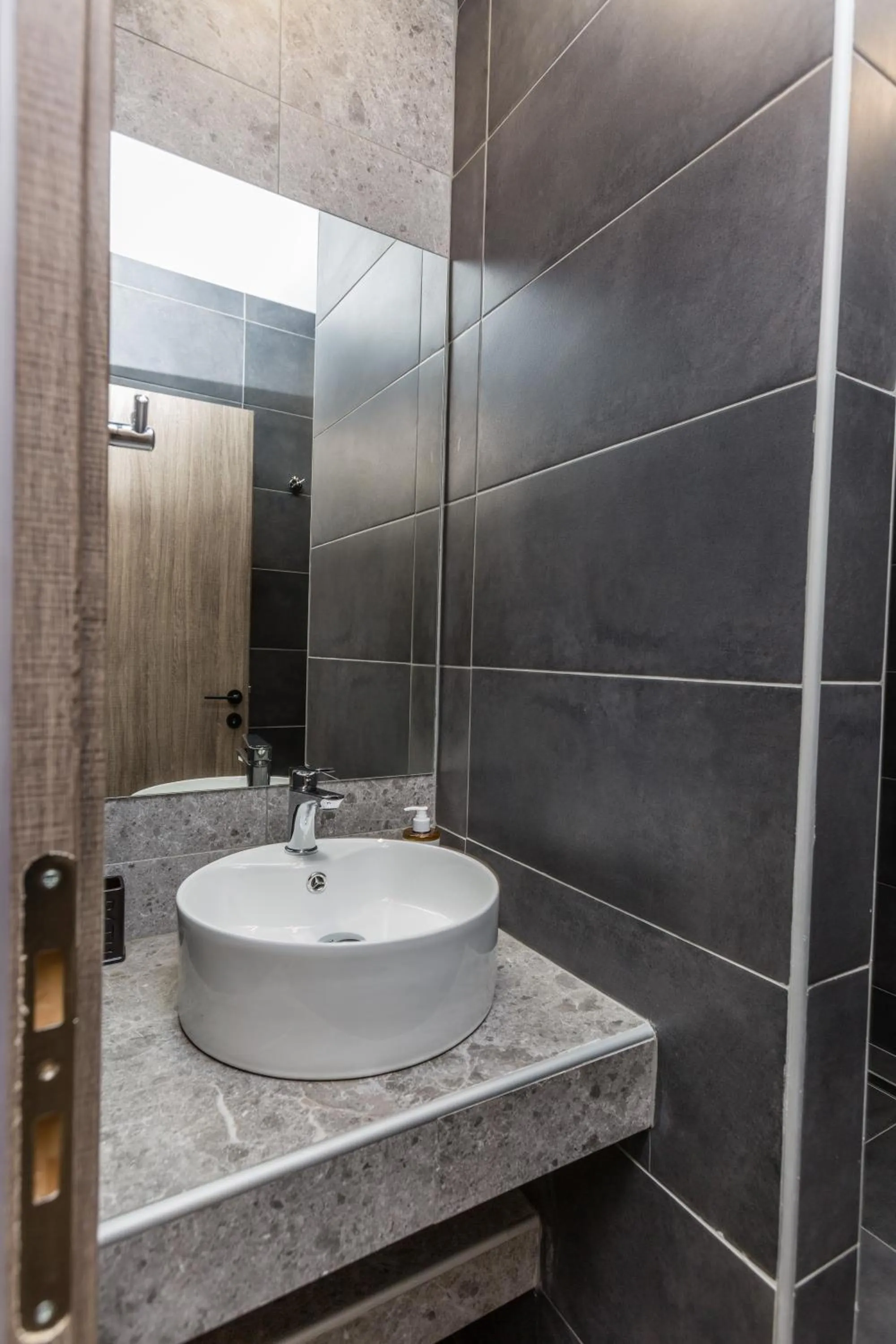 Bathroom in Raise Athens Metro Apartments