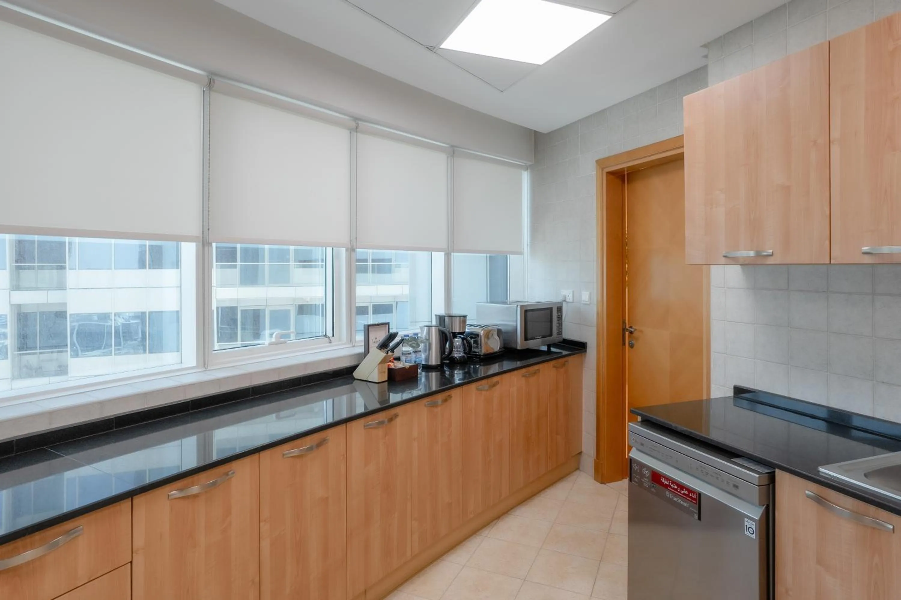 Kitchen or kitchenette in Tamani Marina Hotel & Apartments