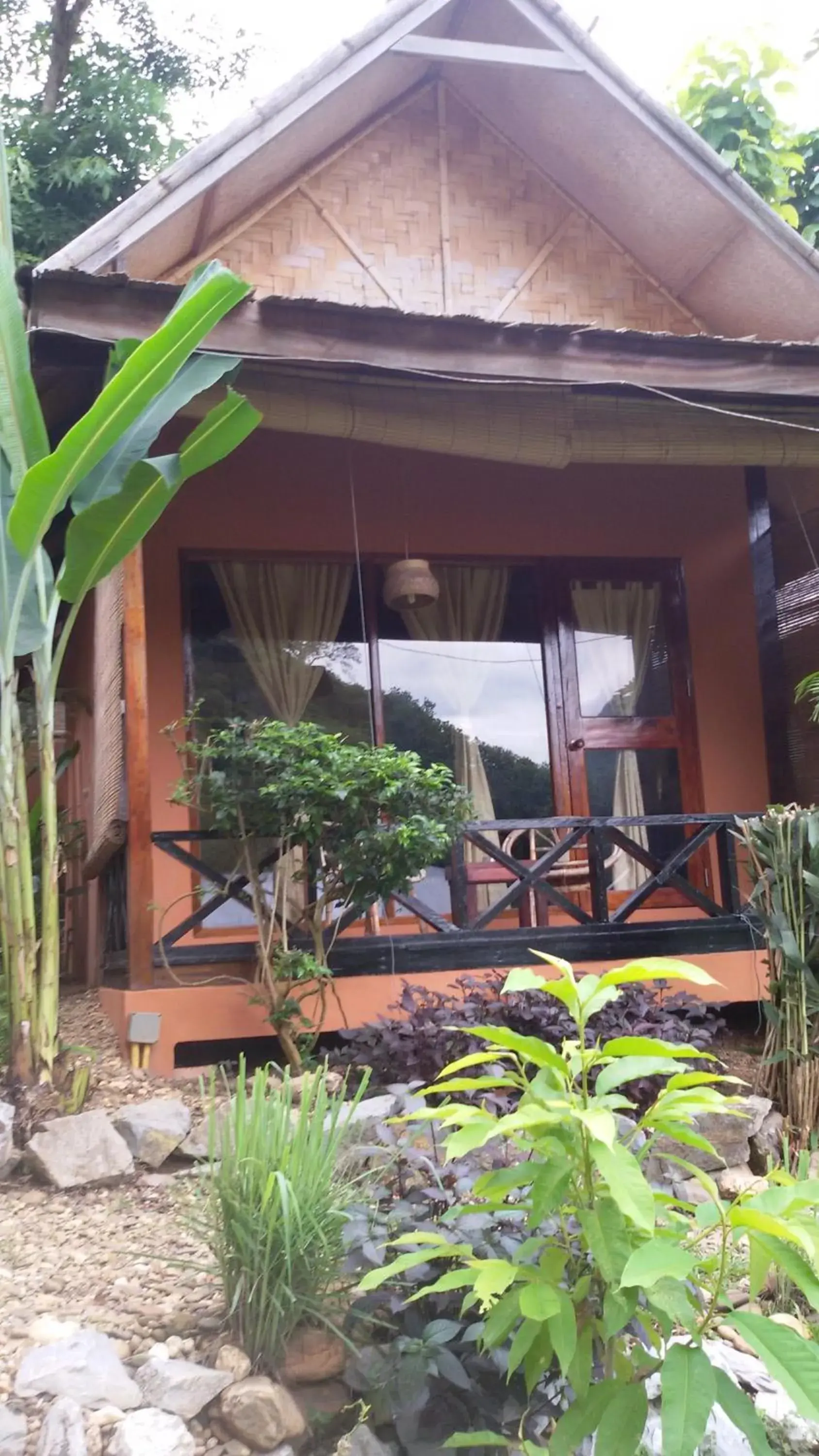 Deluxe Double or Twin Room with River View in Mandala Ou Resort Deluxe Double or Twin Room with River View in Mandala Ou Resort