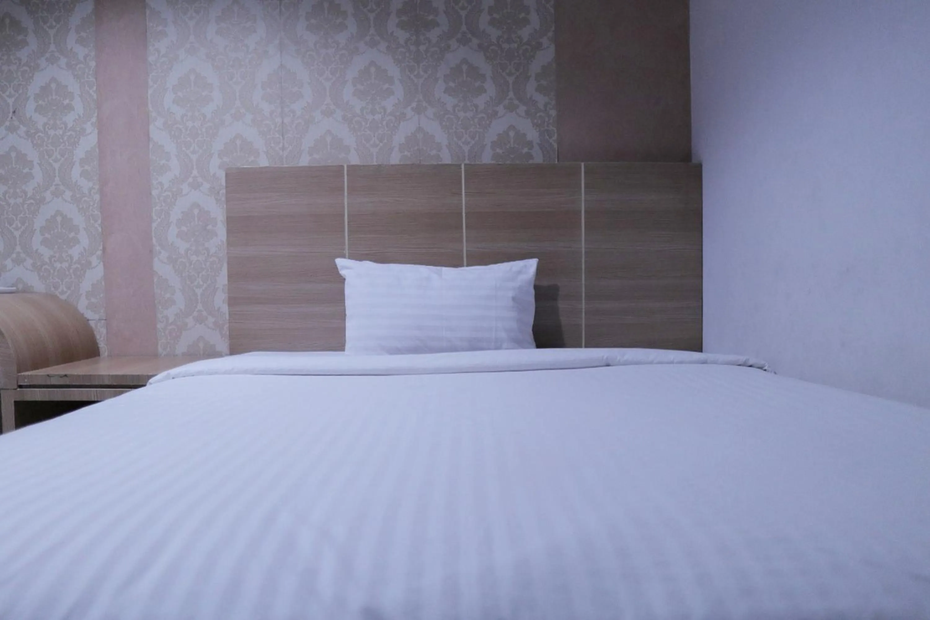 Bed in RedDoorz @ Pasangkayu Mamuju Utara