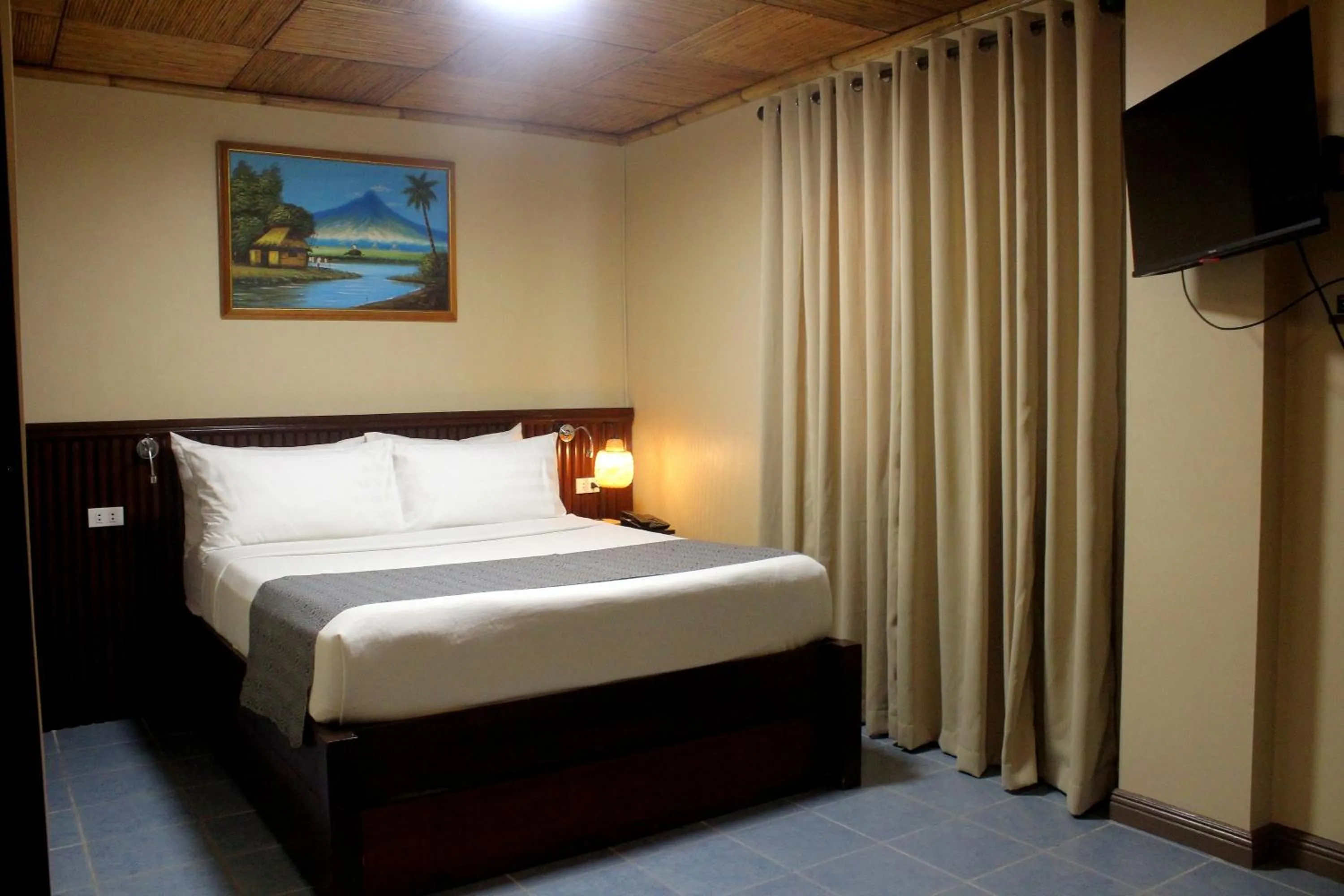 Bed in P&M Final Option Beach Resort