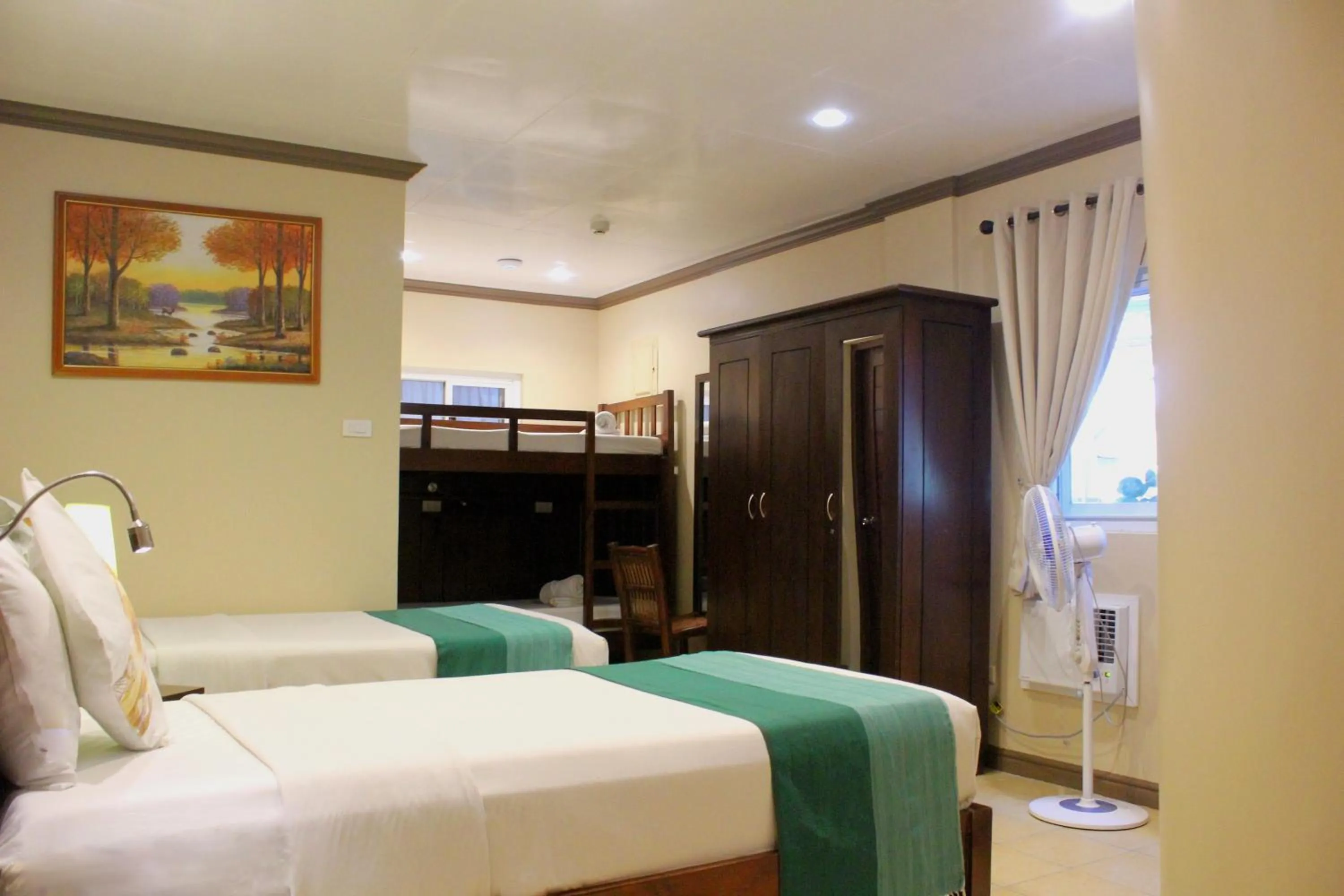 Bed in P&M Final Option Beach Resort