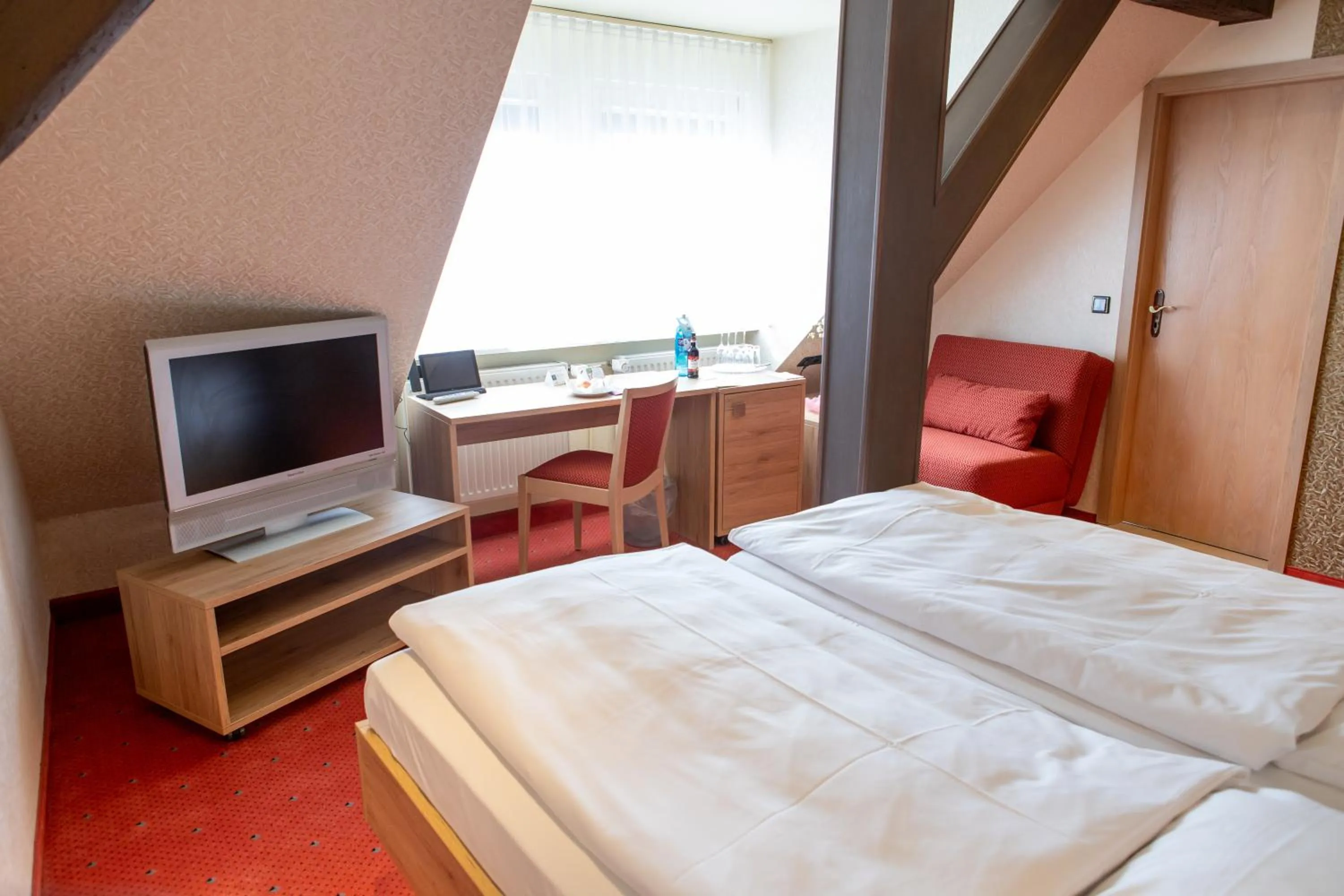 Bed in Flair Hotel Deutsches Haus