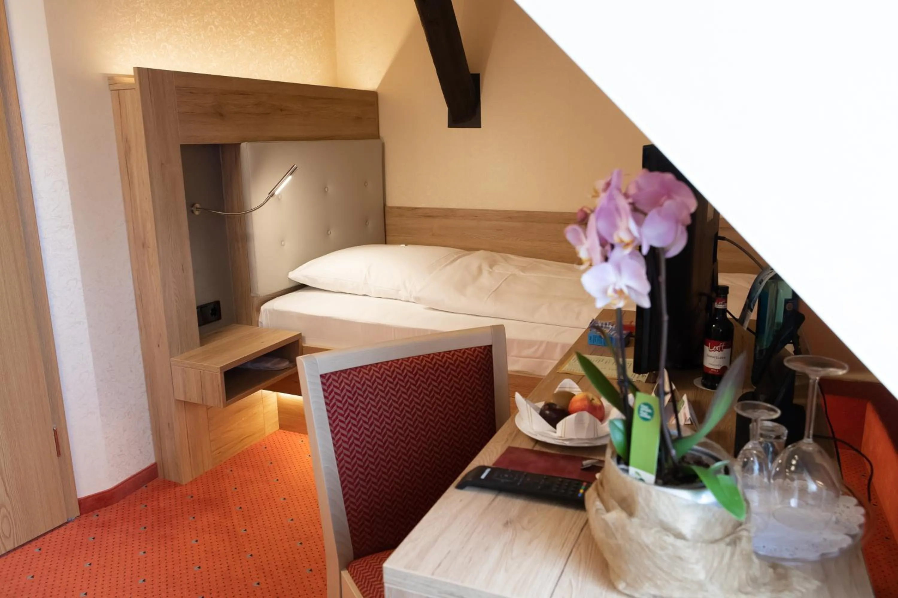 Bed in Flair Hotel Deutsches Haus