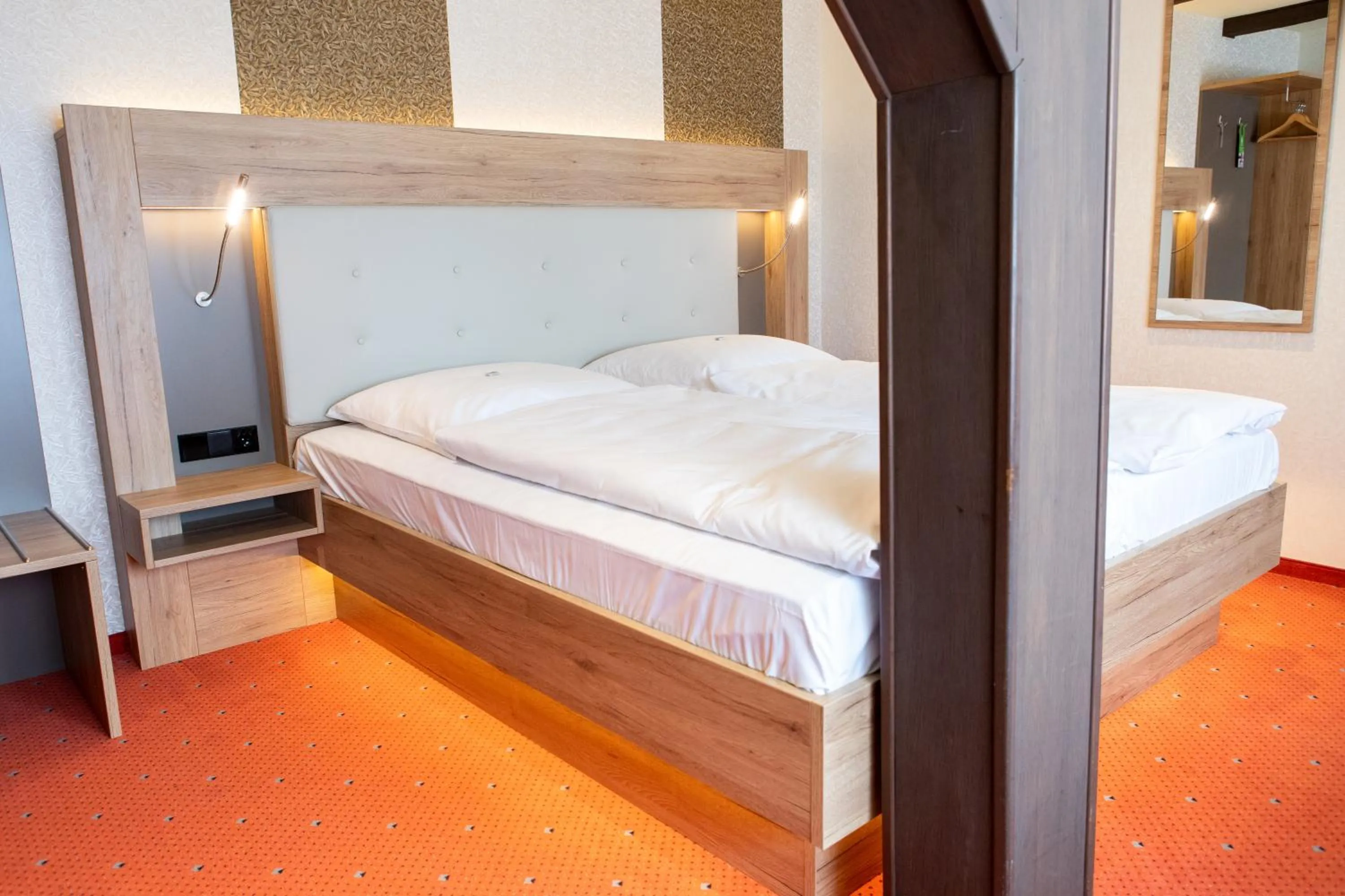 Bed in Flair Hotel Deutsches Haus