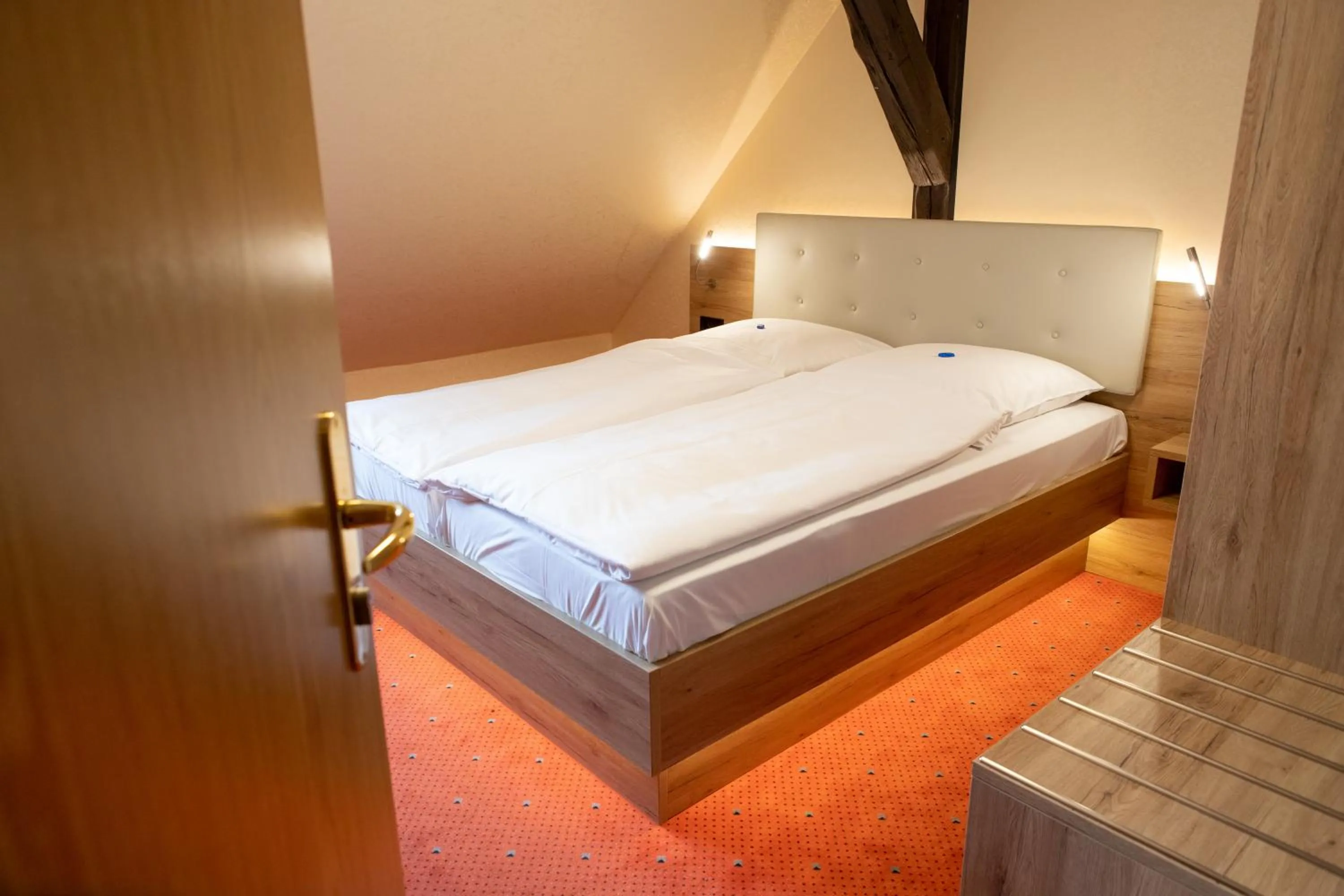 Bed in Flair Hotel Deutsches Haus