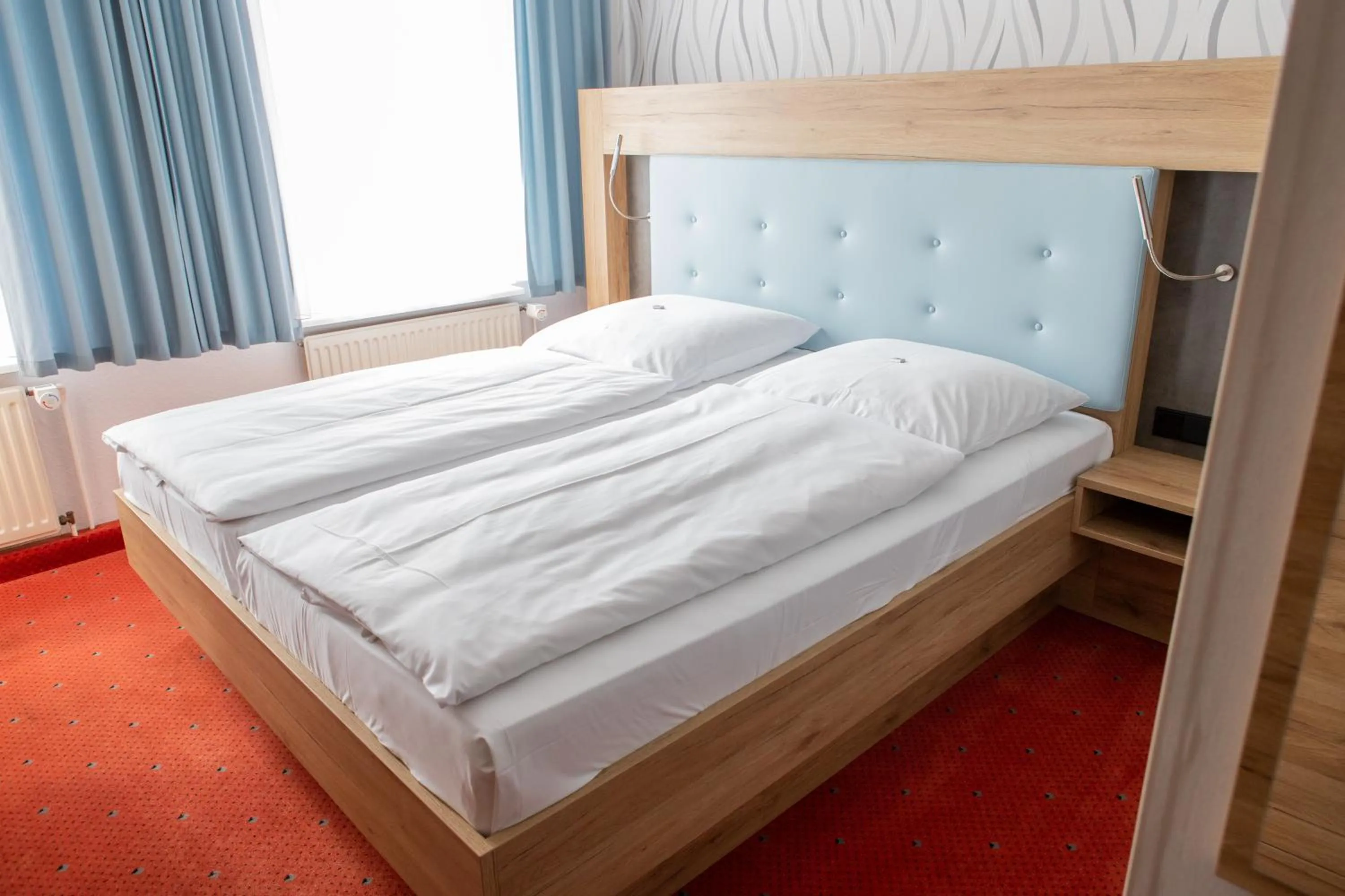 Bed in Flair Hotel Deutsches Haus