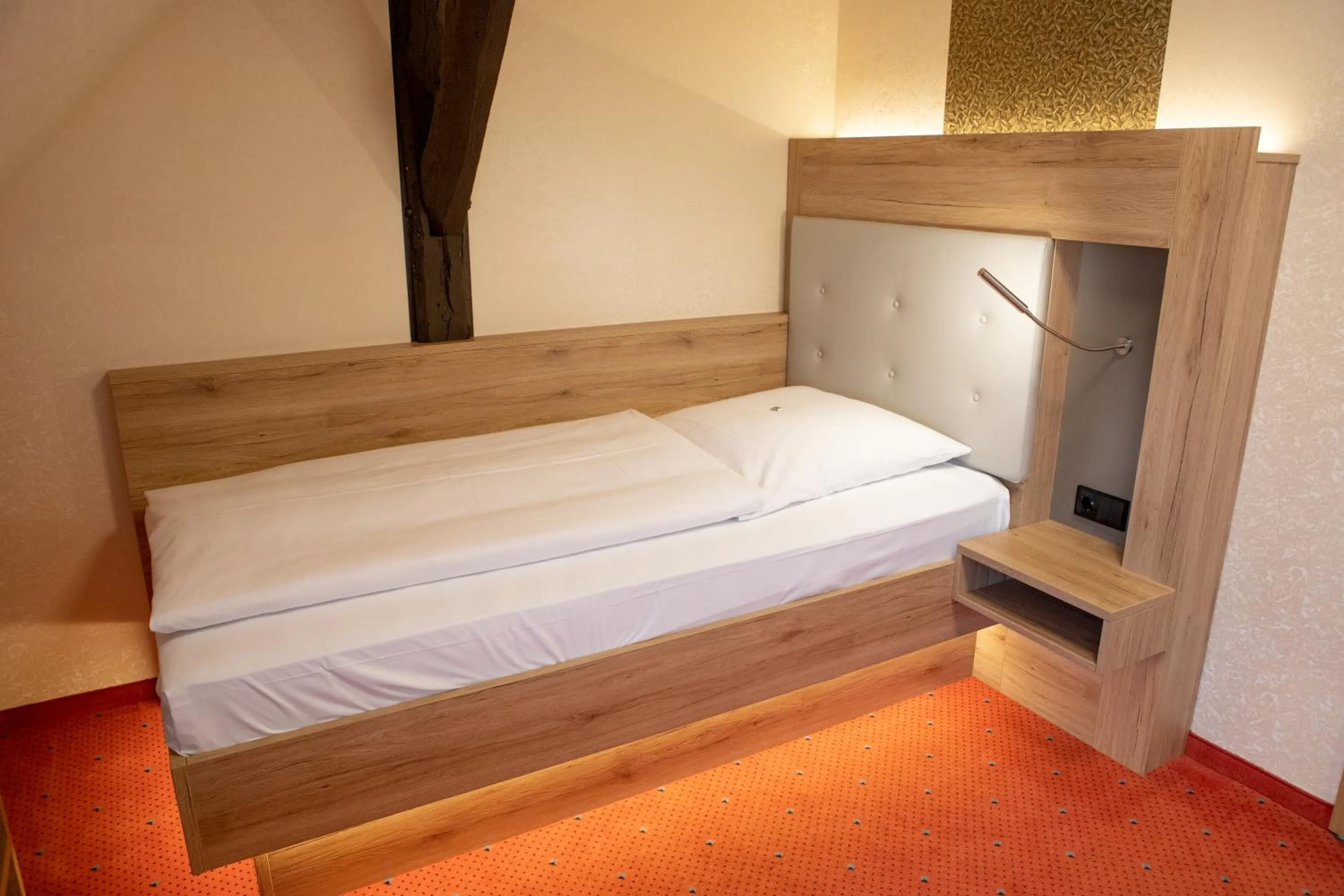 Bed in Flair Hotel Deutsches Haus