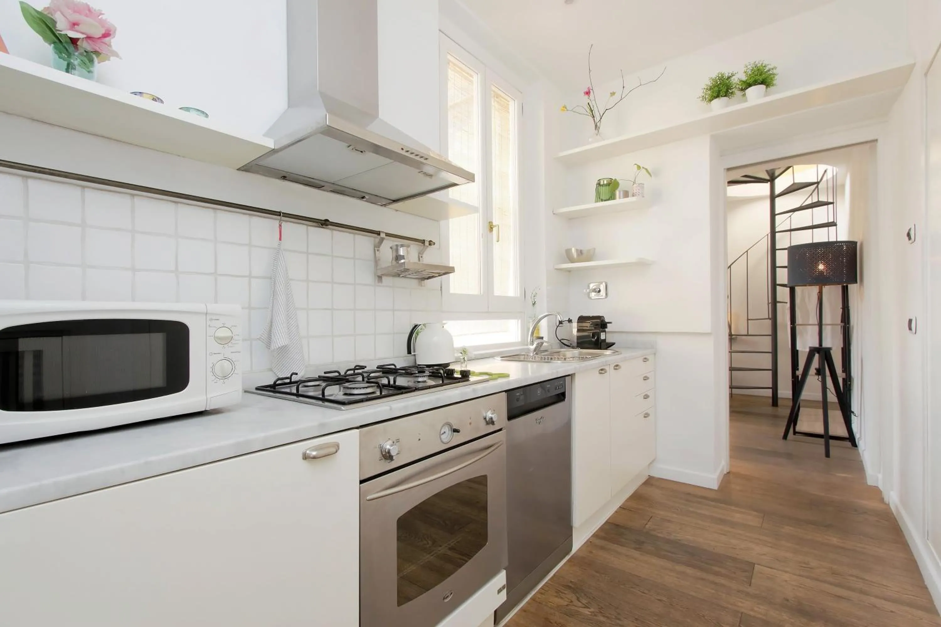Communal kitchen in Colosseo Terrace Apartment