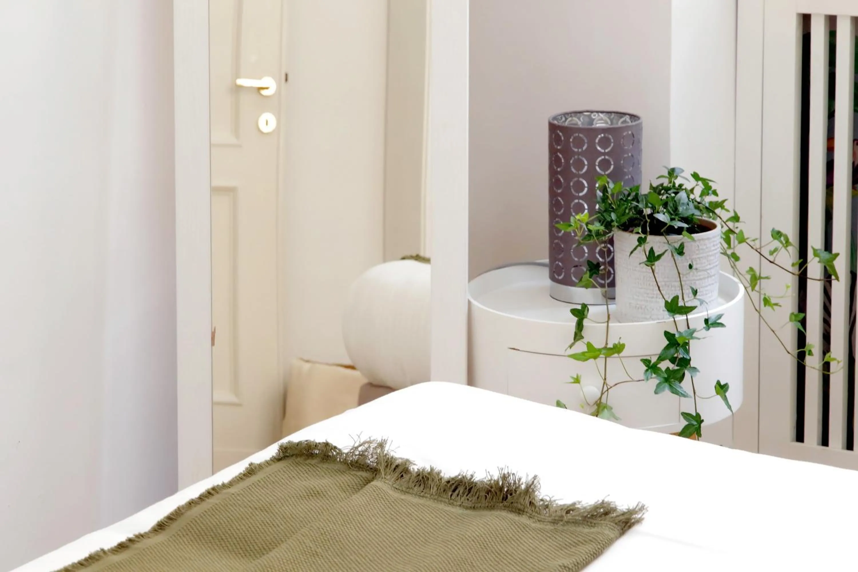 Decorative detail, Bed in Colosseo Terrace Apartment