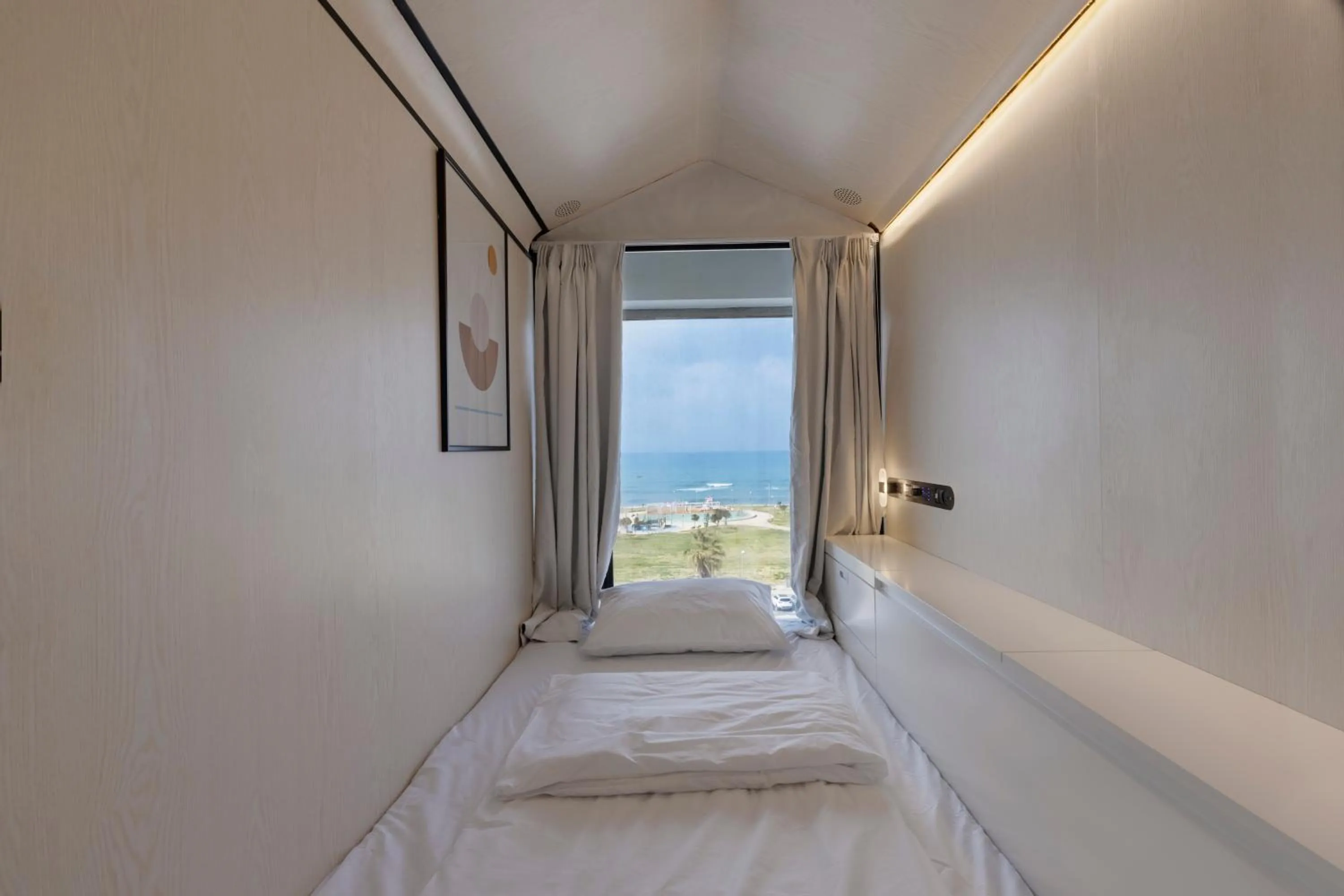 Bed in The O Pod Capsule Hotel