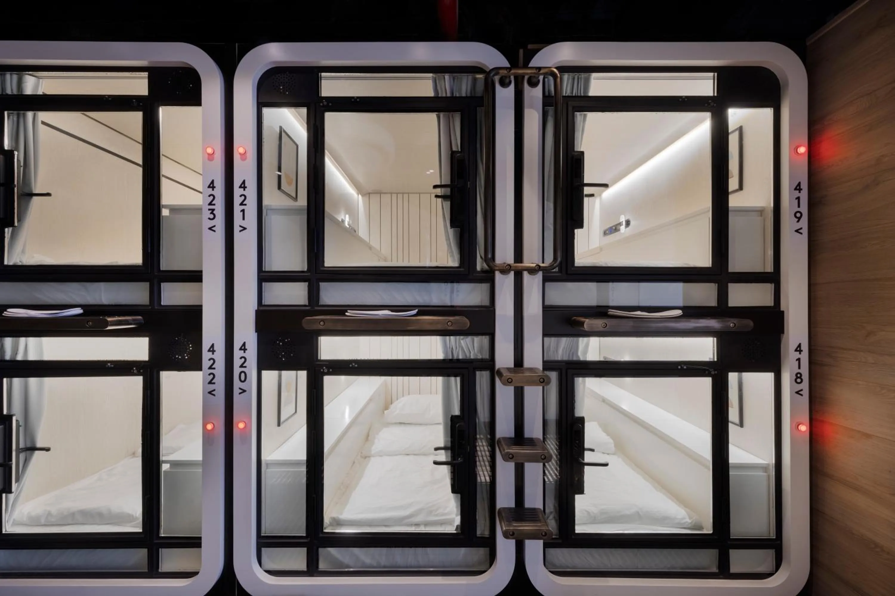 bunk bed in The O Pod Capsule Hotel