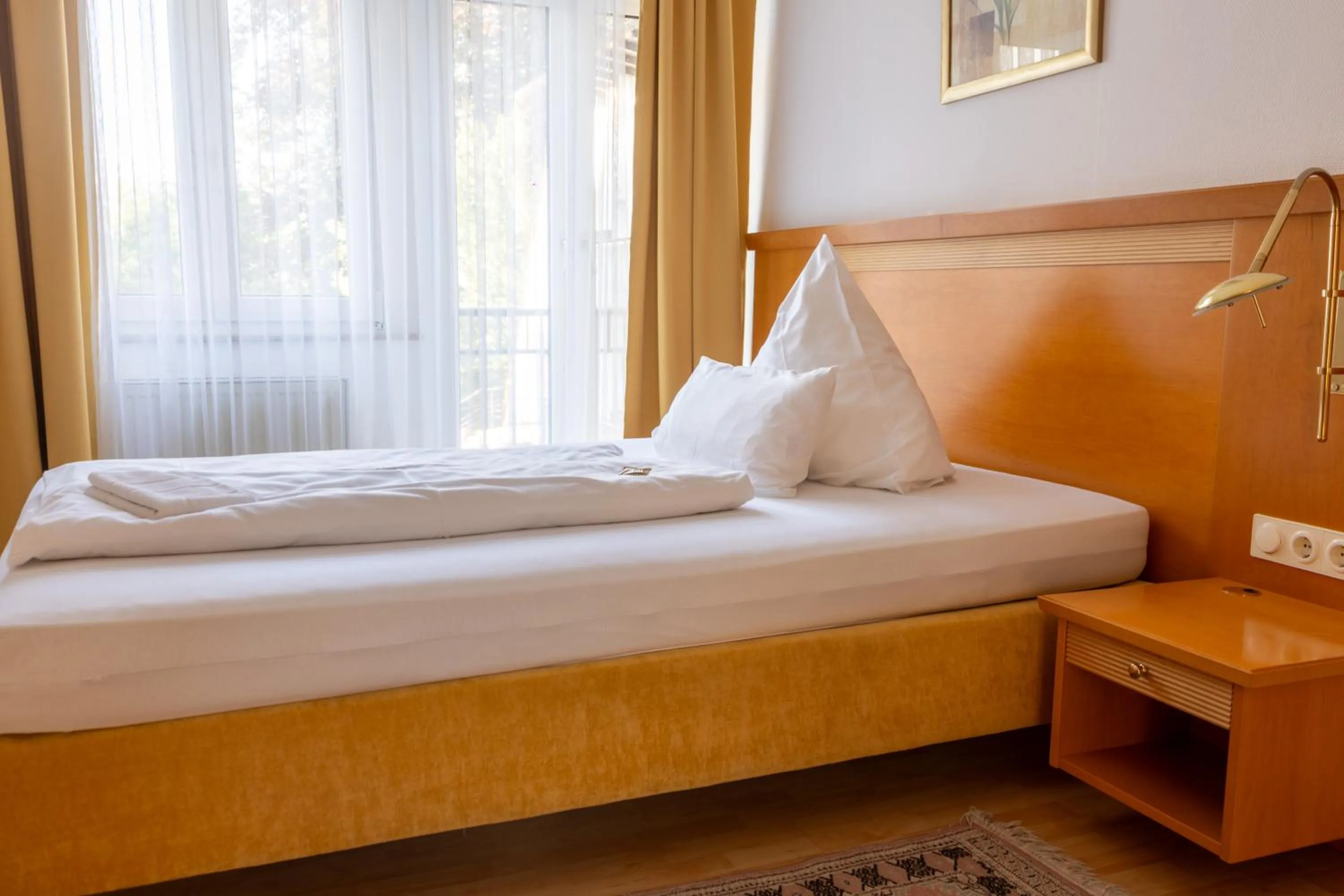 Bed in Hotel Weisses Haus