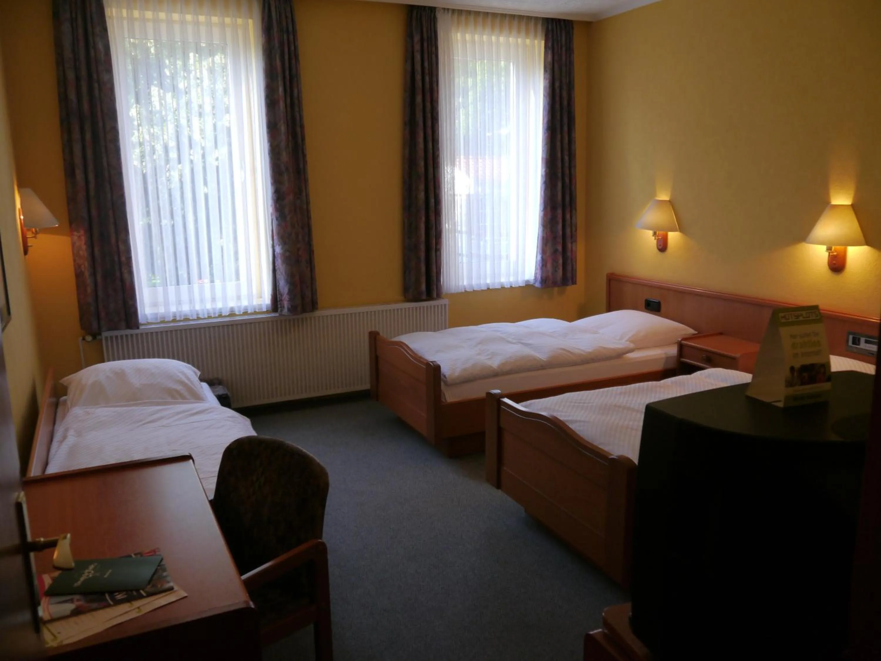Photo of the whole room, Bed in Hotel Deutsche Eiche in Northeim