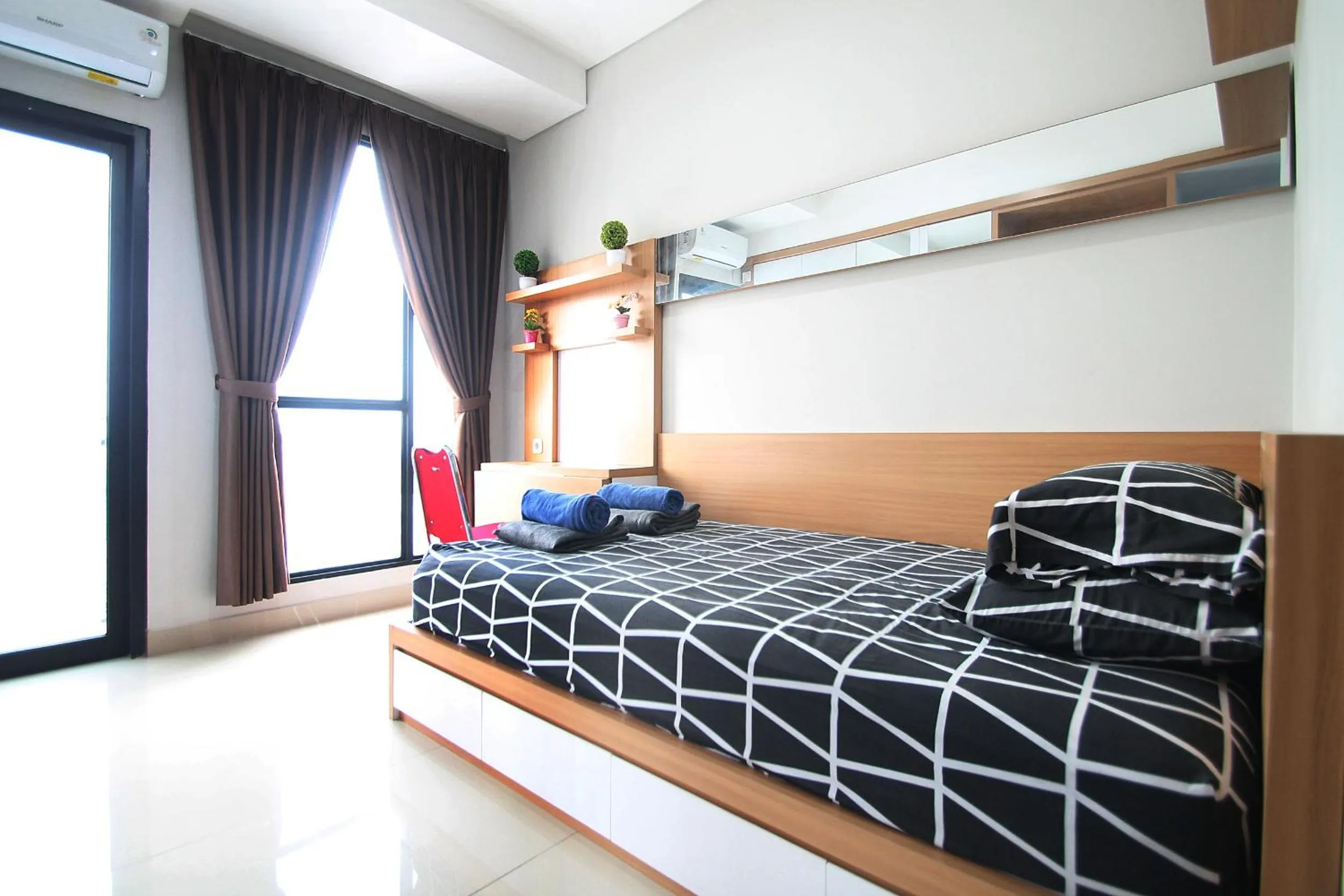 Bed in Apartemen Monroe Jababeka Cikarang Bekasi by Aparian
