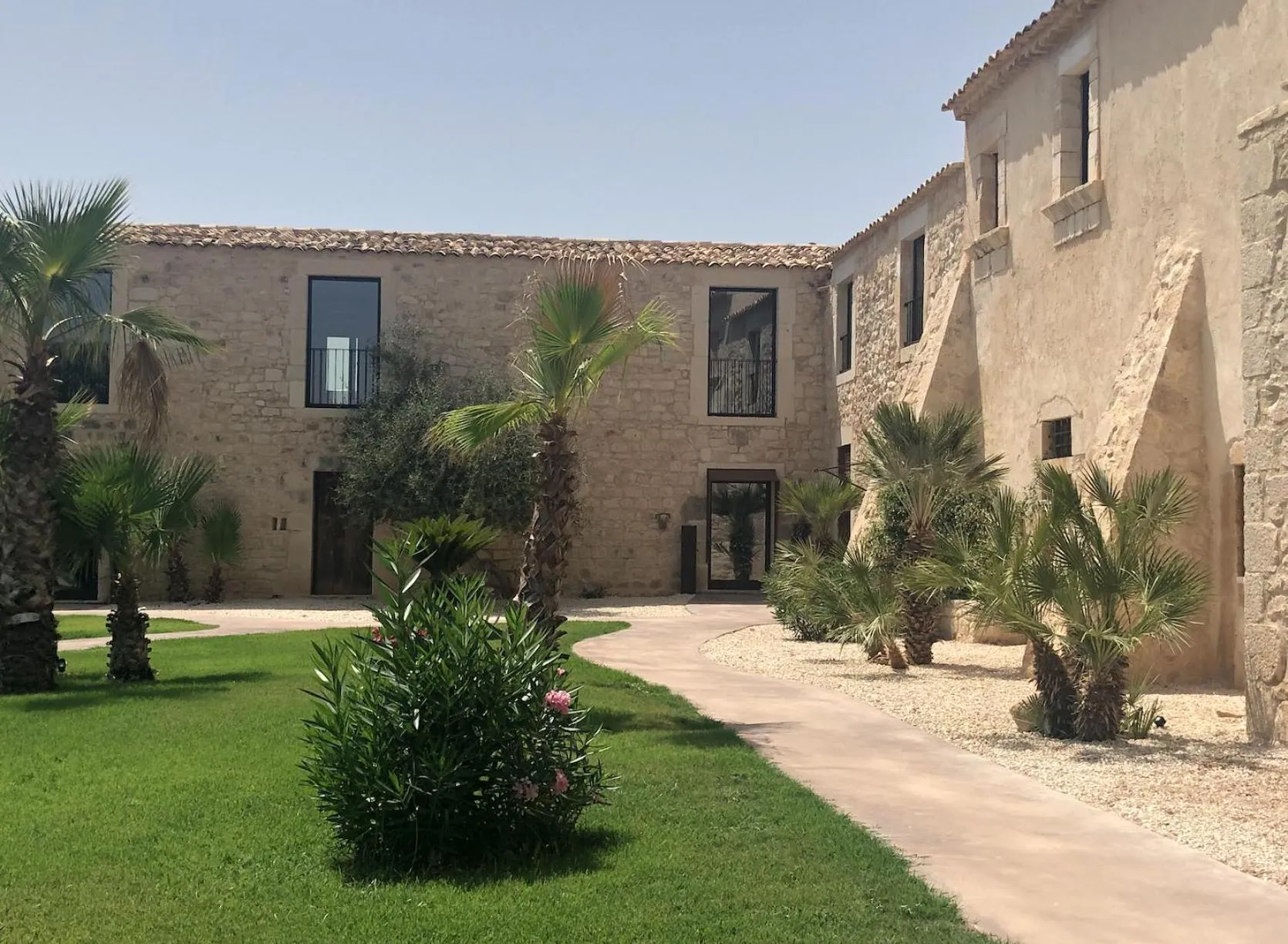 Property building in Pietra d'Acqua Resort & Spa by Geocharme