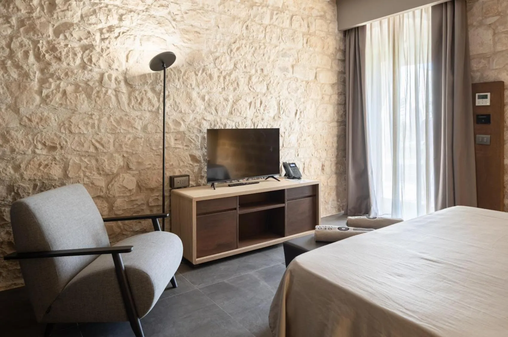 Bedroom, Bed in Pietra d'Acqua Resort & Spa by Geocharme