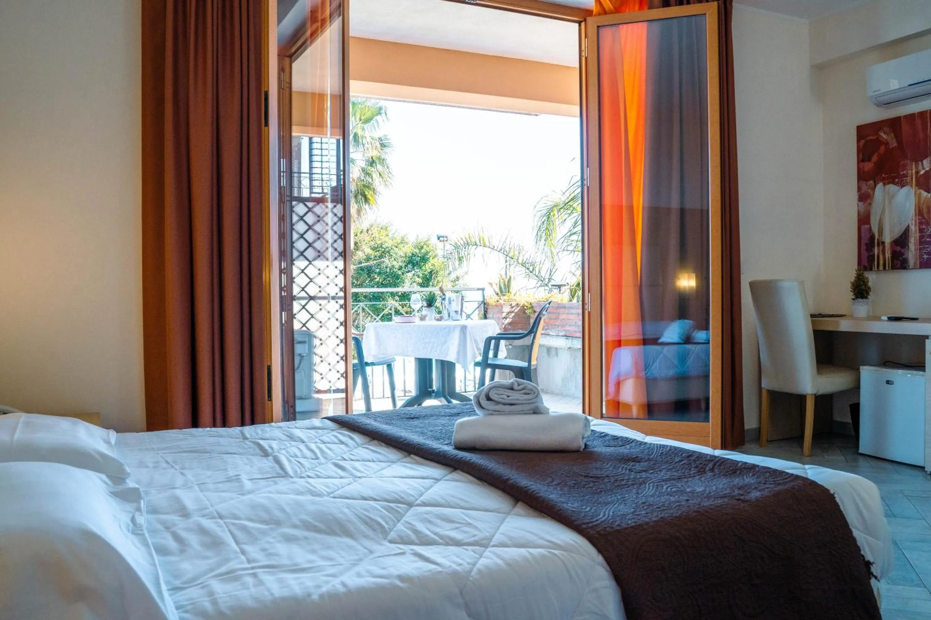 Bed in Taormina Hotel Calipso