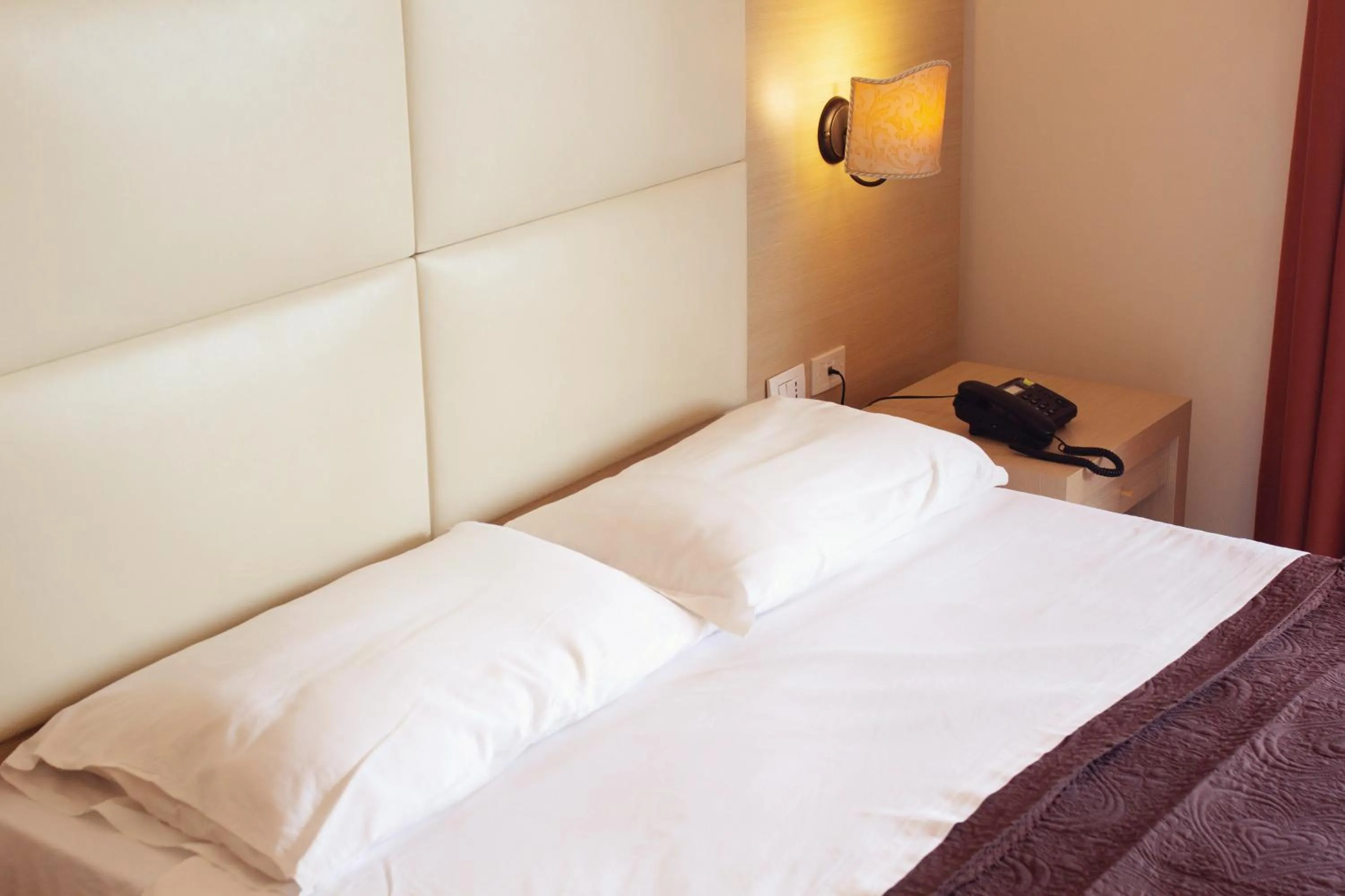 Bed in Taormina Hotel Calipso