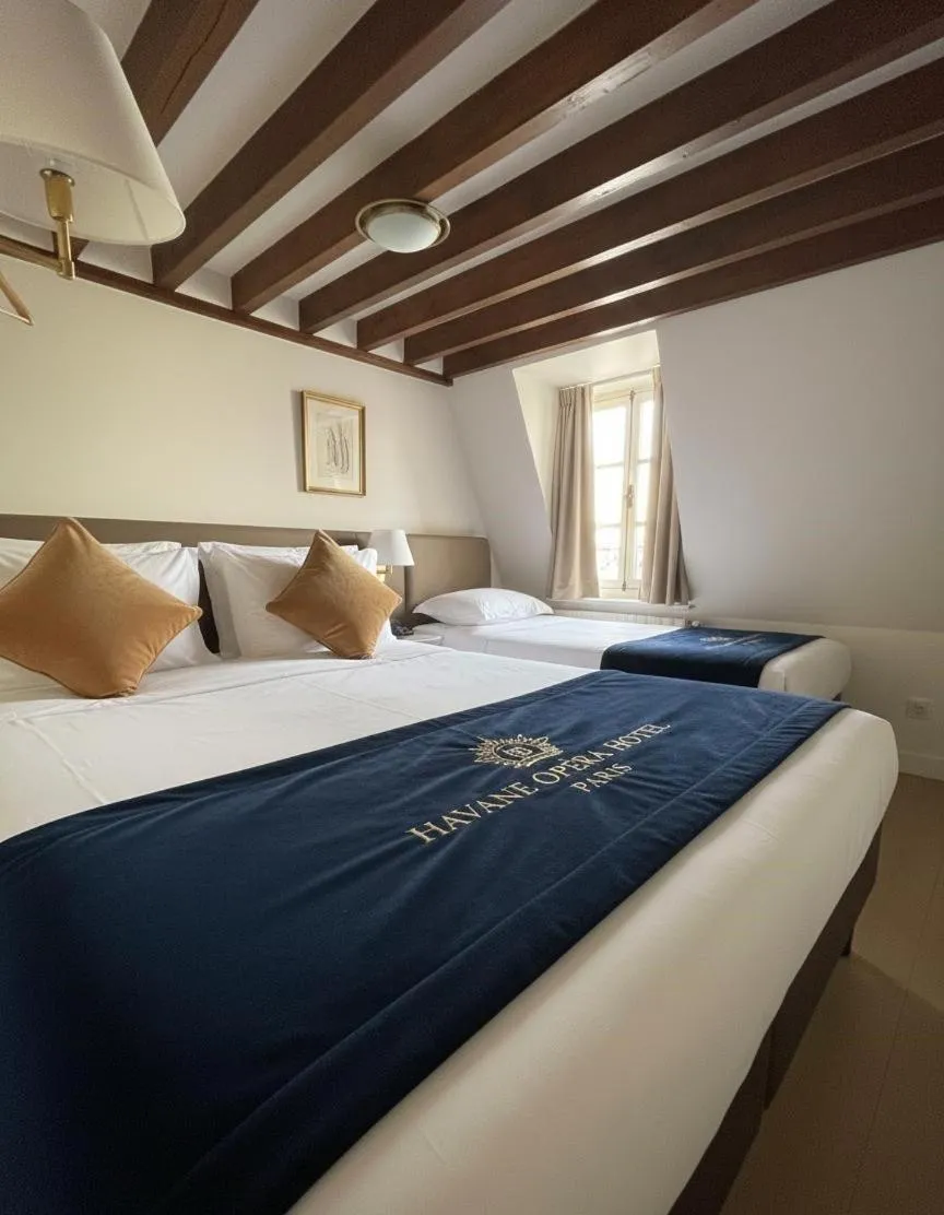 Bed in Hotel Havane Opera