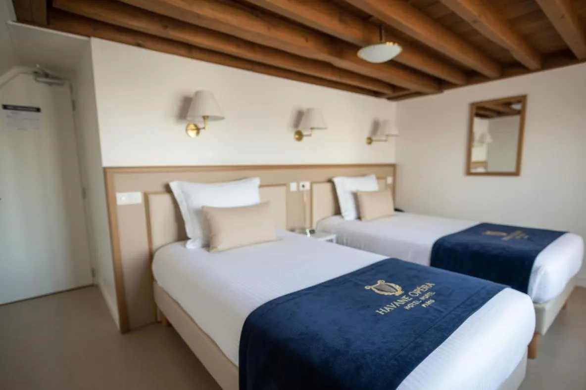 Bed in Hotel Havane Opera