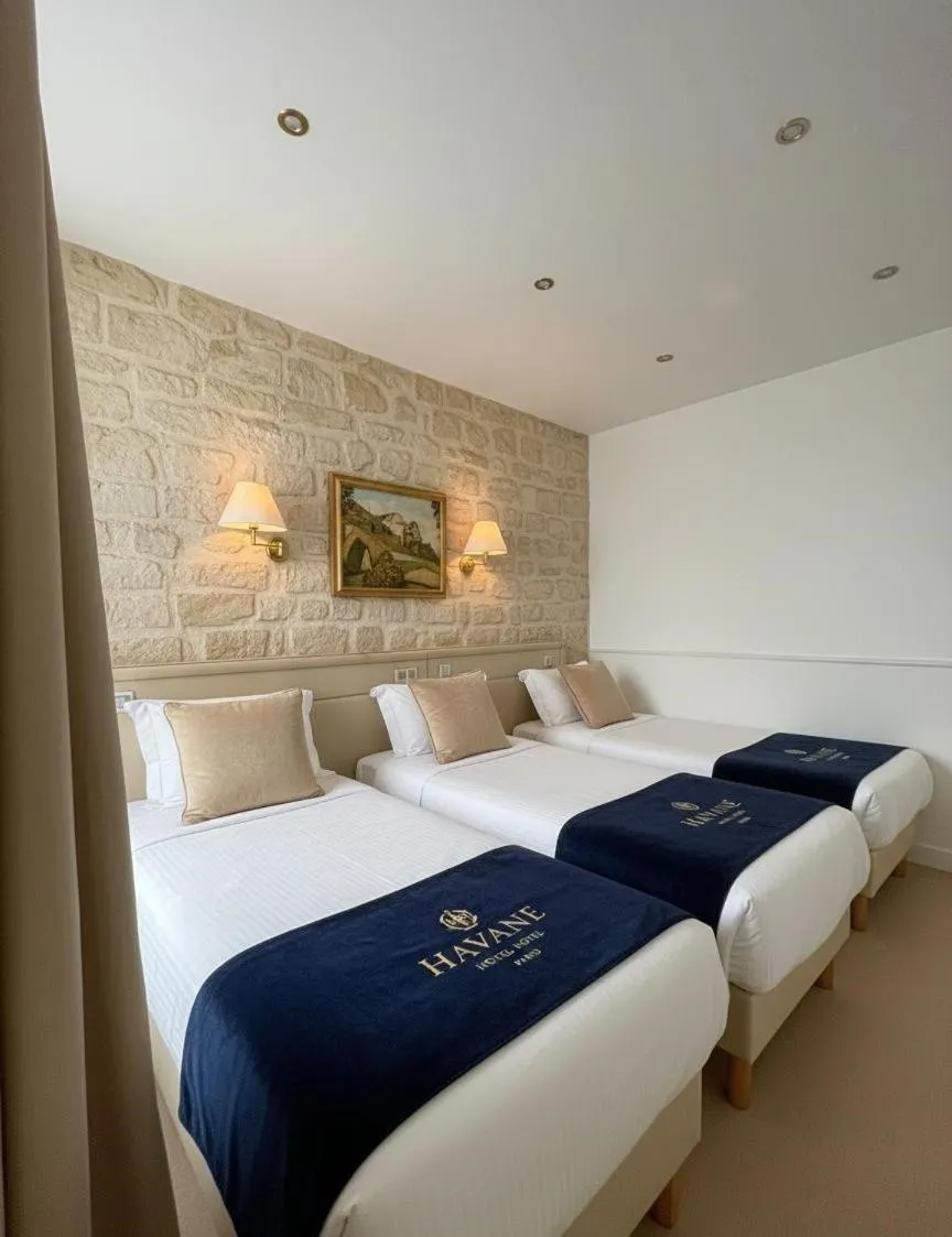 Bed in Hotel Havane Opera