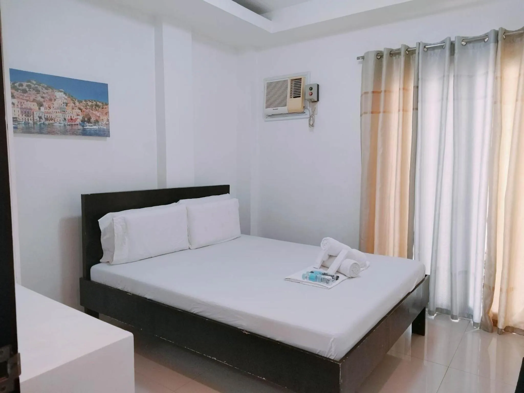 Bed in Livewire Planet Suites