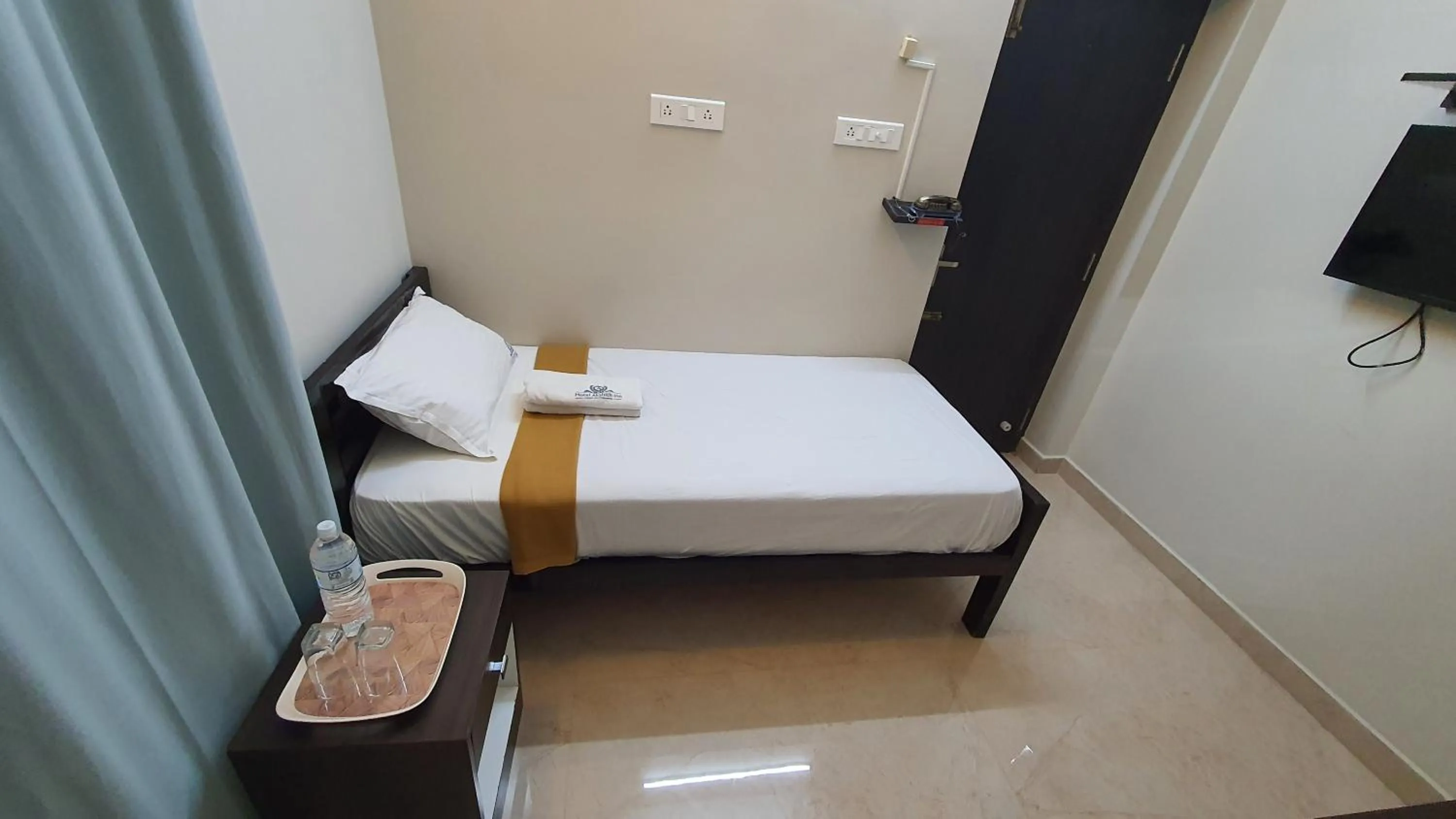 Photo of the whole room, Bed in Hotel Akshith Inn