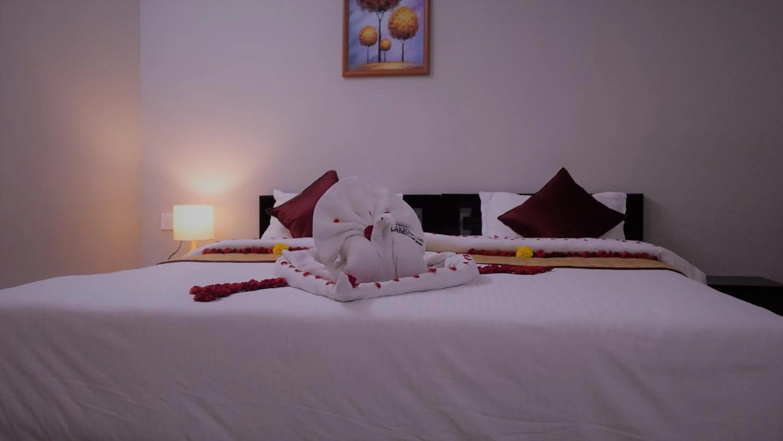 Bed in Hotel Akshith Inn