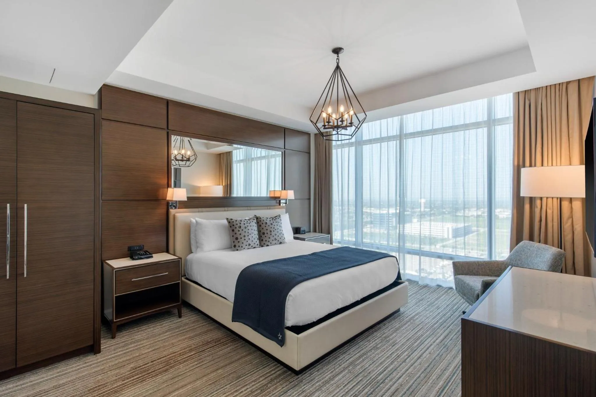 Photo of the whole room, Bed in Omni Frisco at The Star