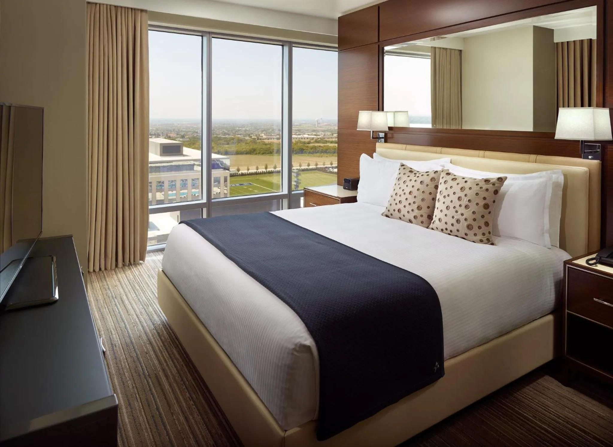 Photo of the whole room, Bed in Omni Frisco at The Star