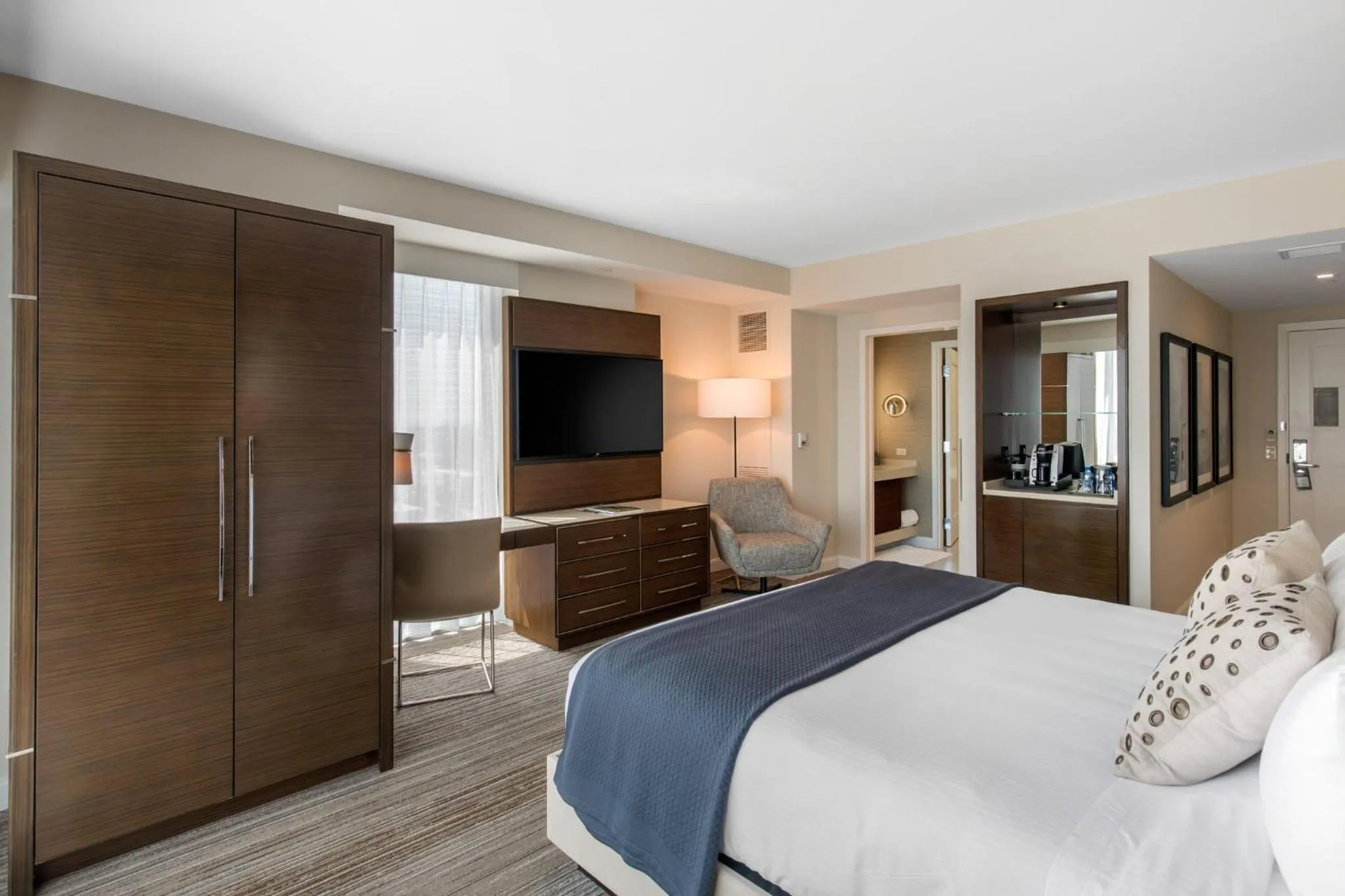 Photo of the whole room, Bed in Omni Frisco at The Star