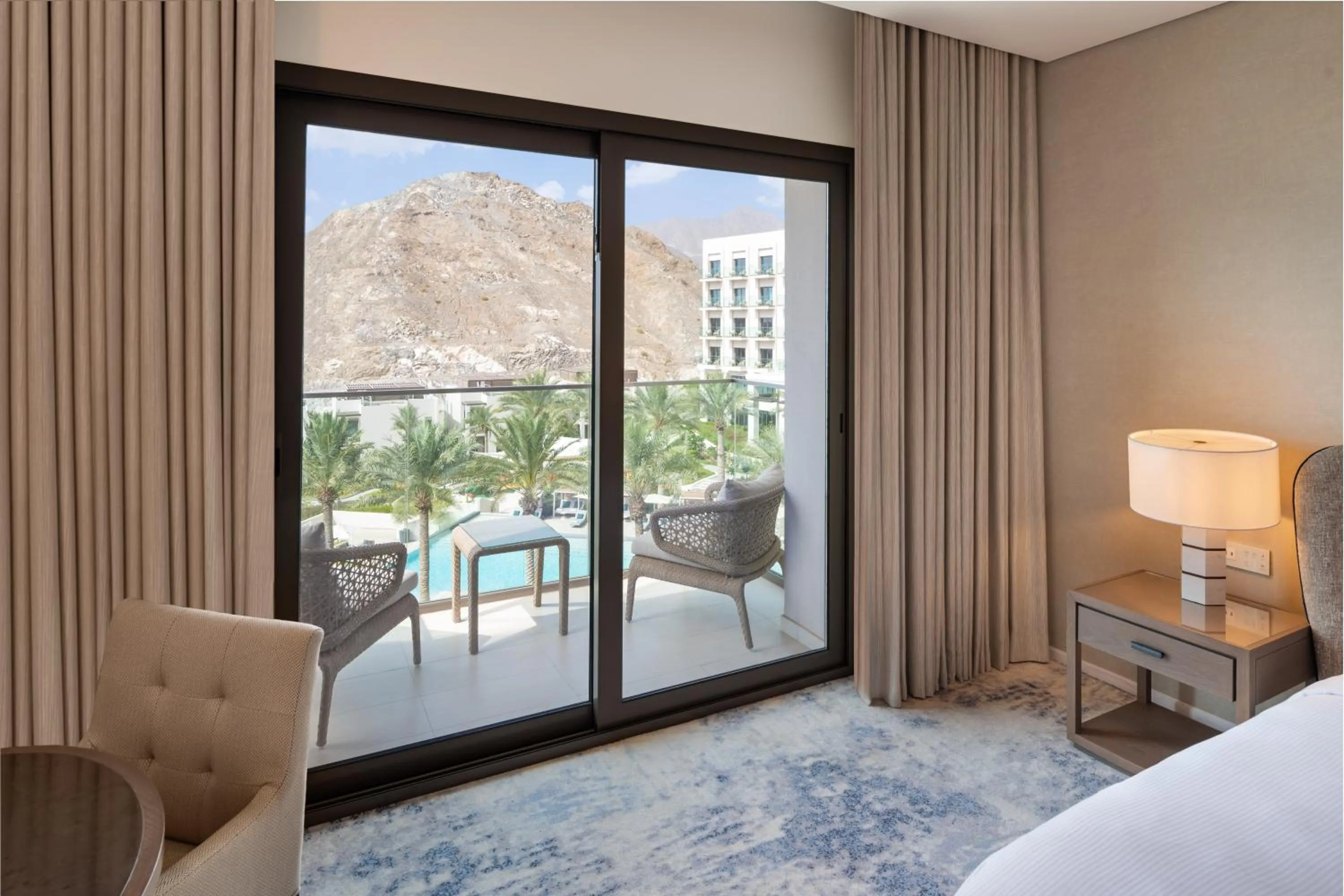 Pool view, Bed in Address Beach Resort Fujairah