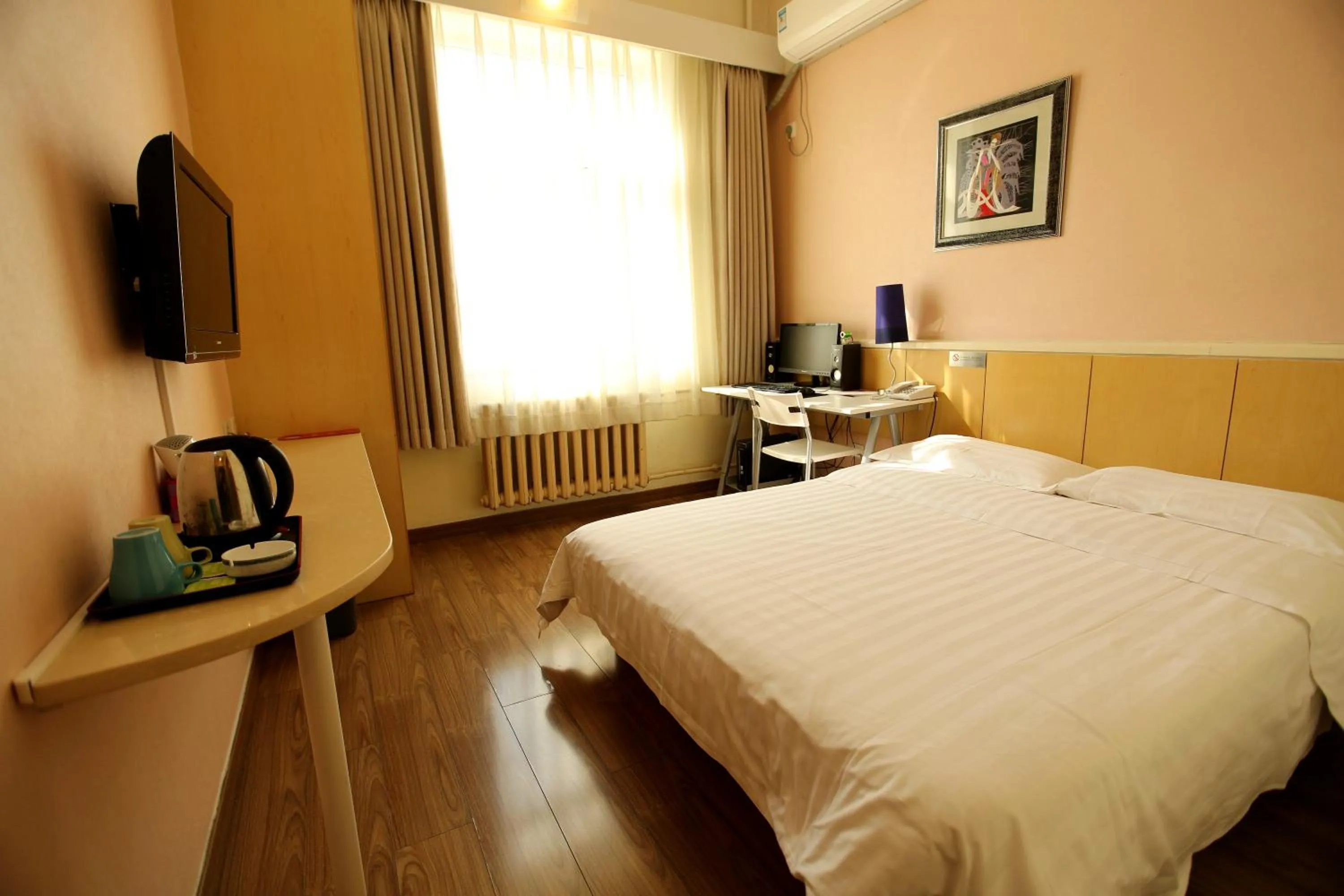Photo of the whole room in Beijing Sicily Hotel