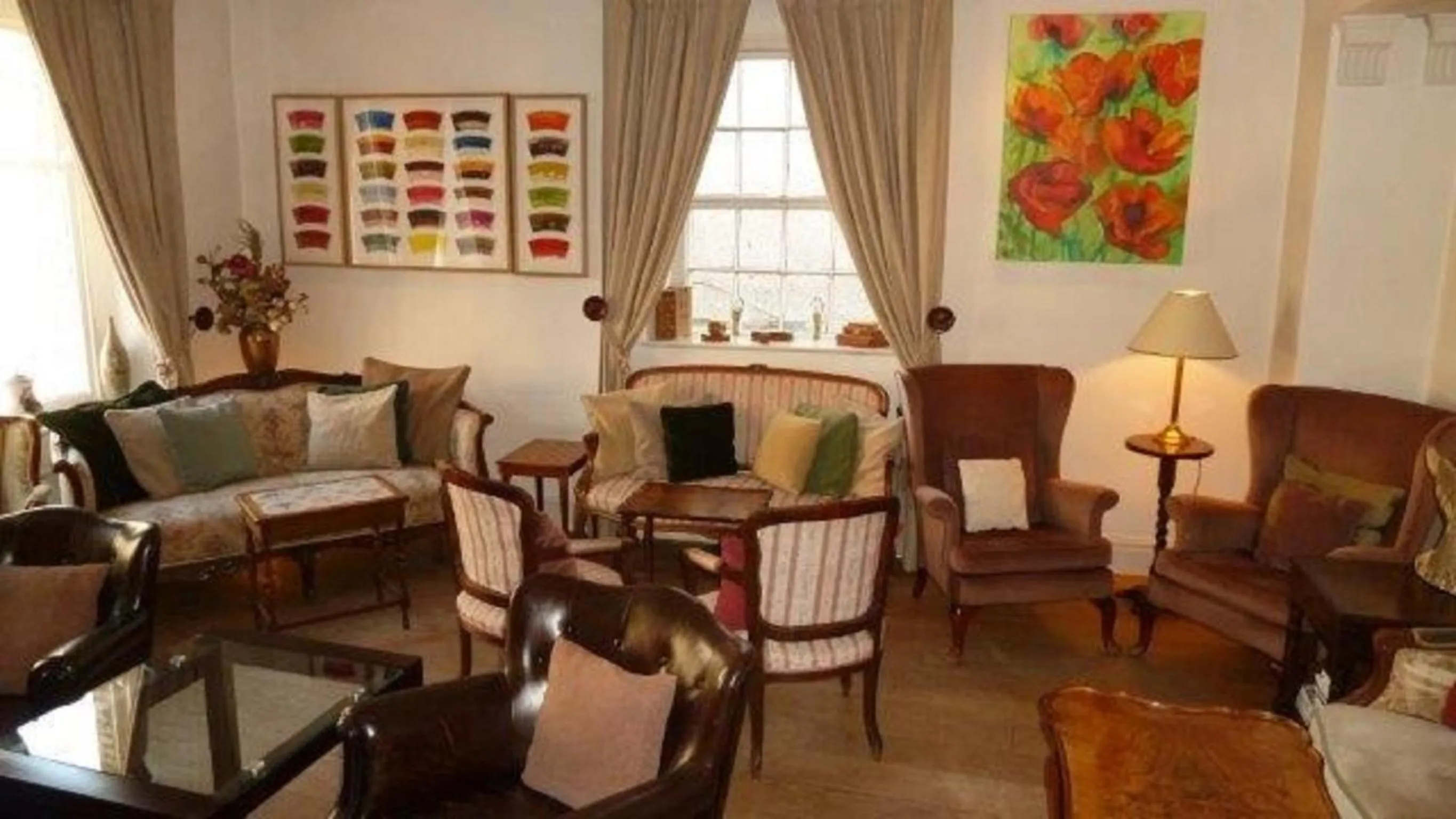 Communal lounge/ TV room in The Frenchgate Hotel