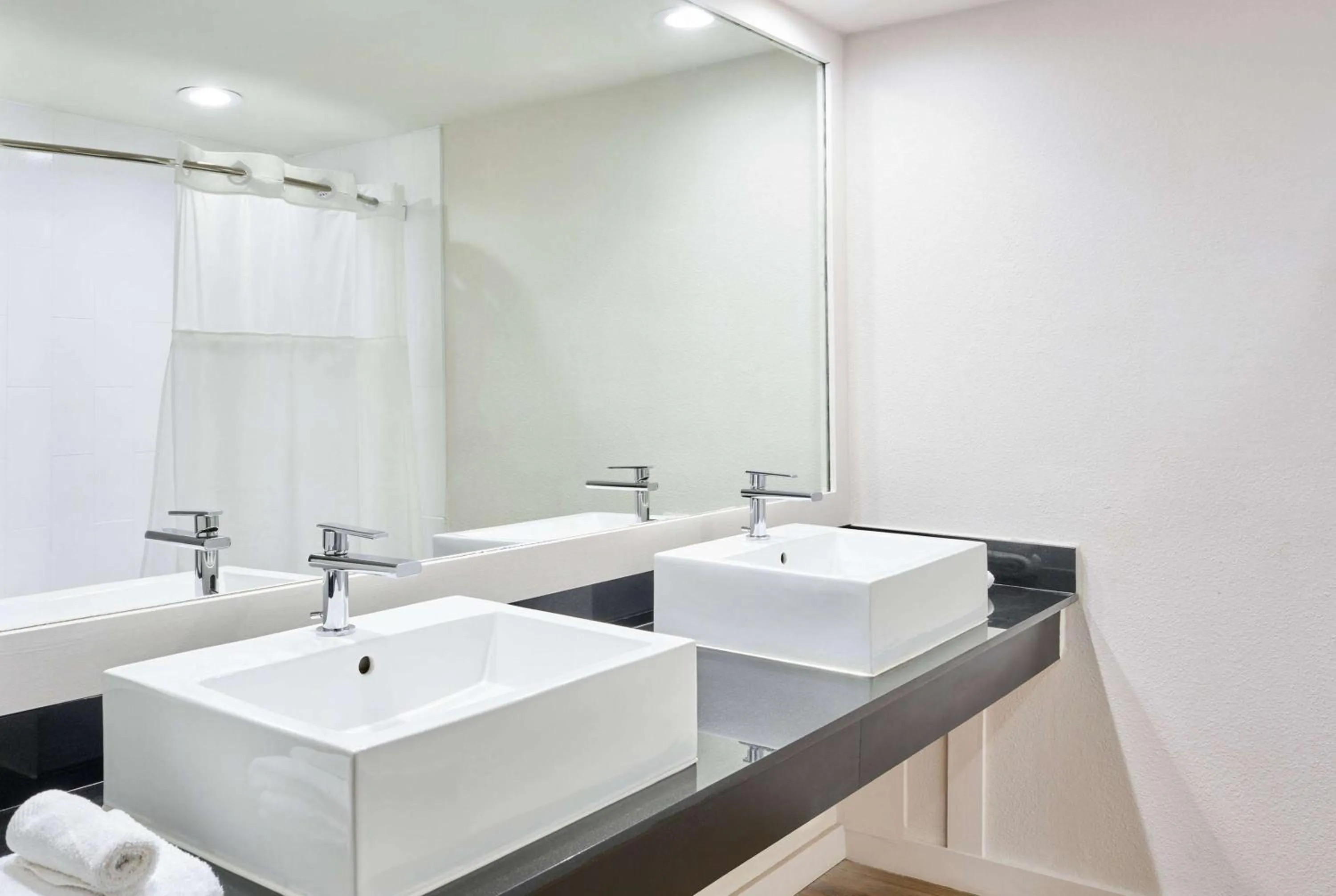 Bathroom in voco Sandpiper All-Inclusive Resort by IHG