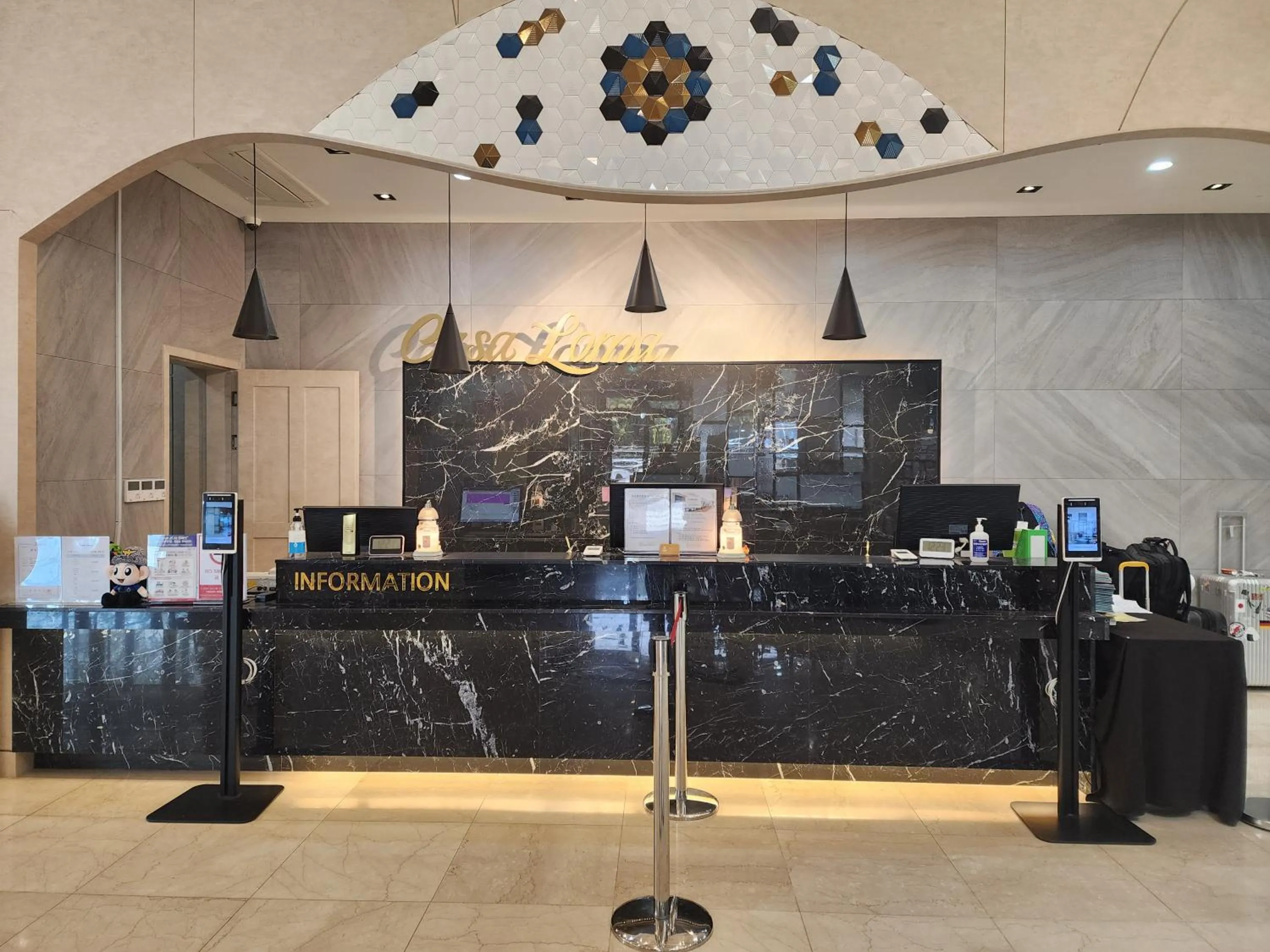 Lobby or reception in Casaloma Hotel