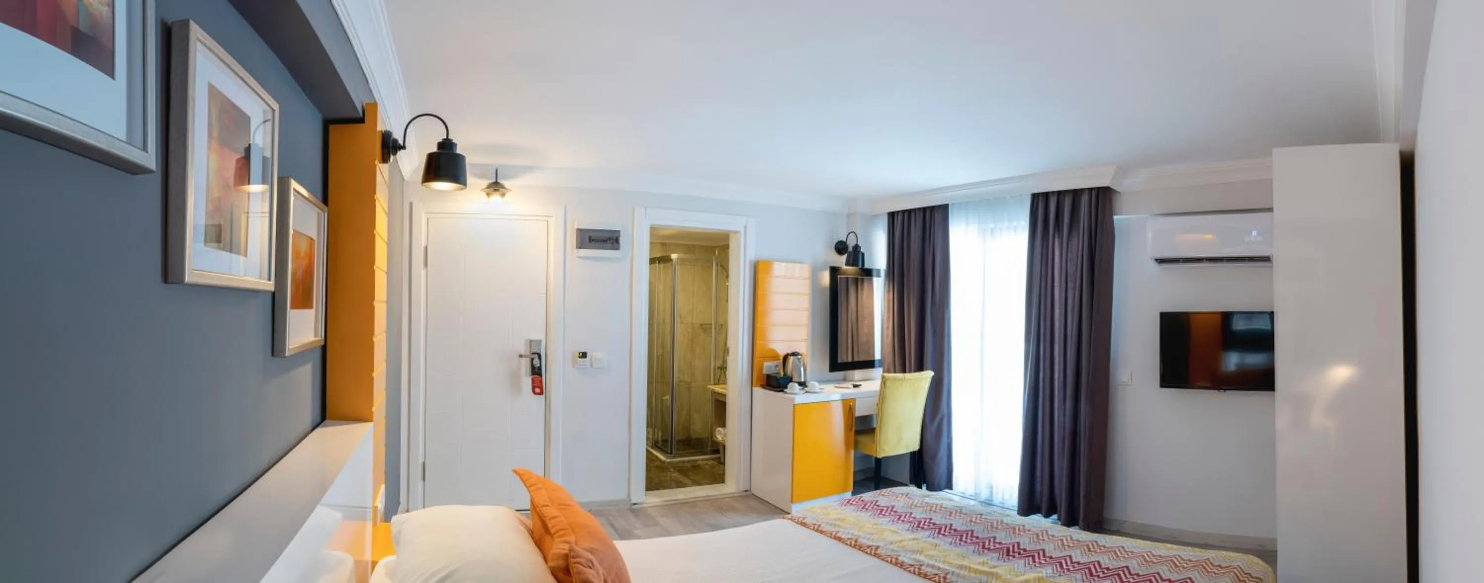 Bed, TV/Entertainment Center in Akdora Resort Hotel & Spa