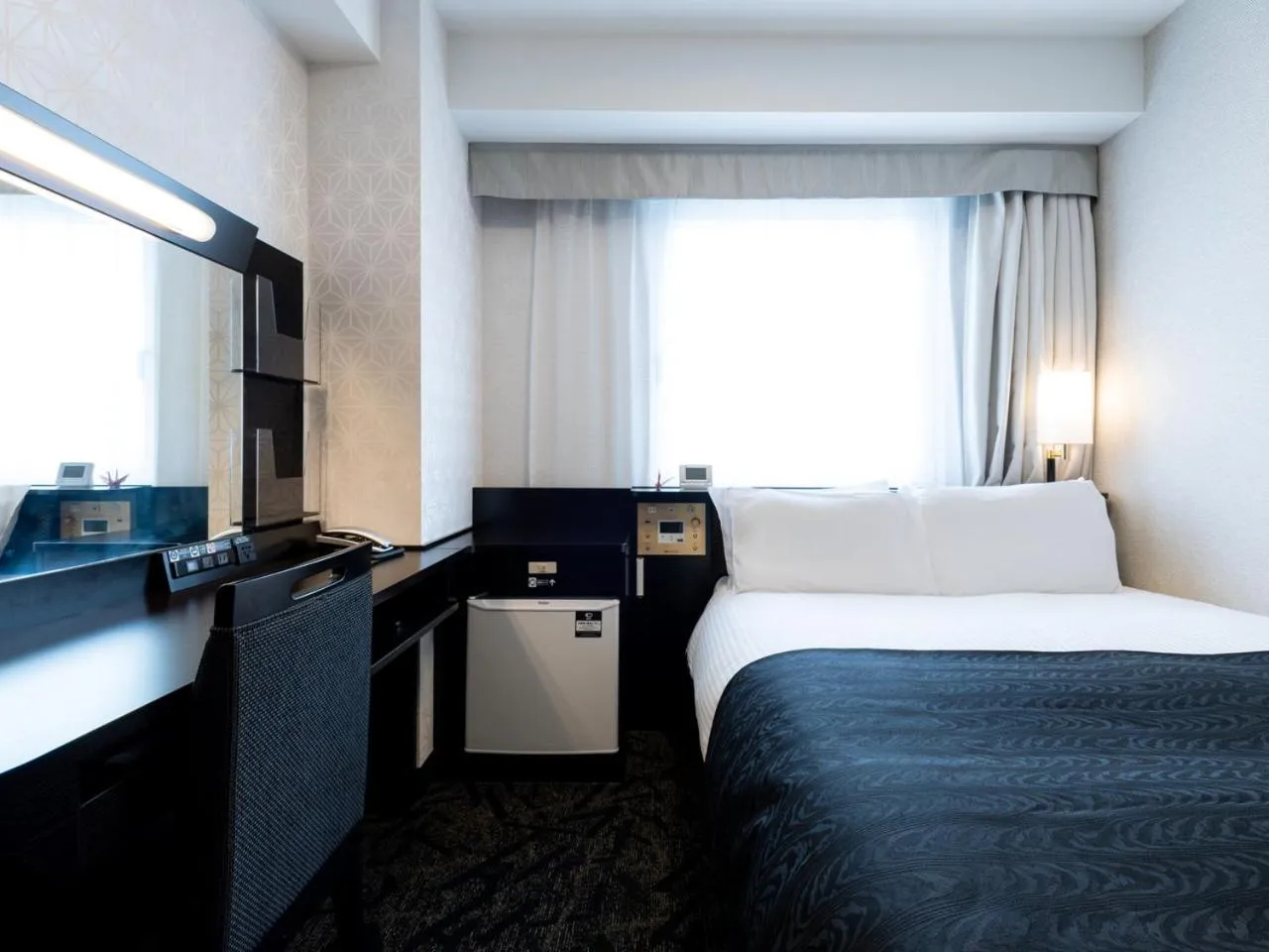 Bed in APA Hotel Nishifunabashi Ekimae