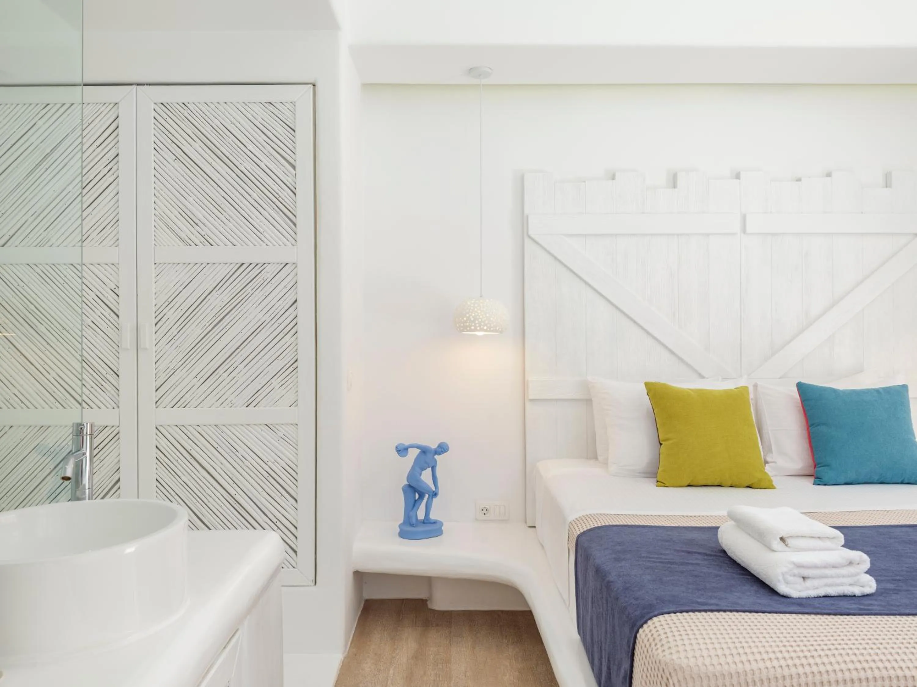 Bed in Akkadian LGBT Boutique Hotel