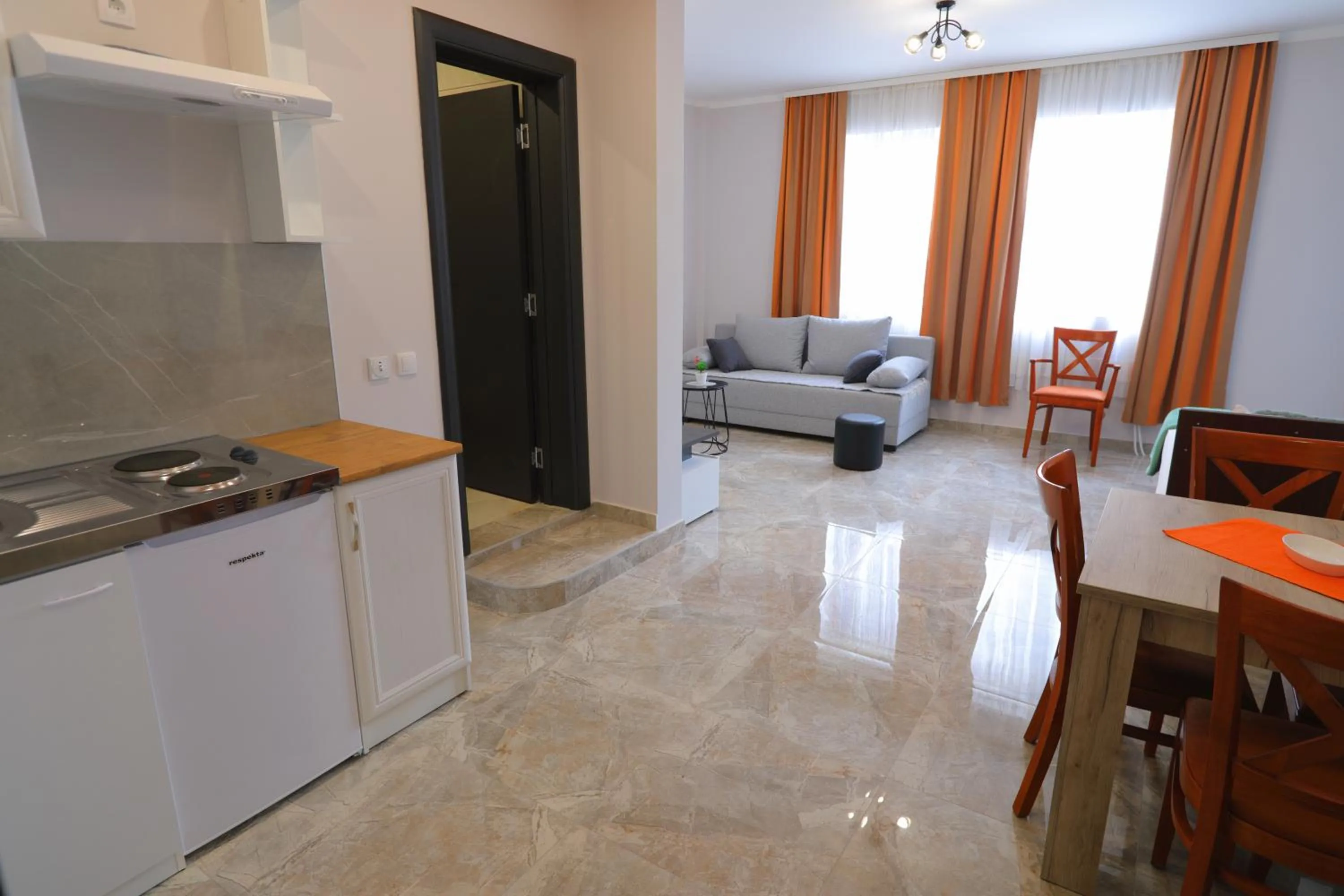 Kitchen or kitchenette in Fenix Apartments