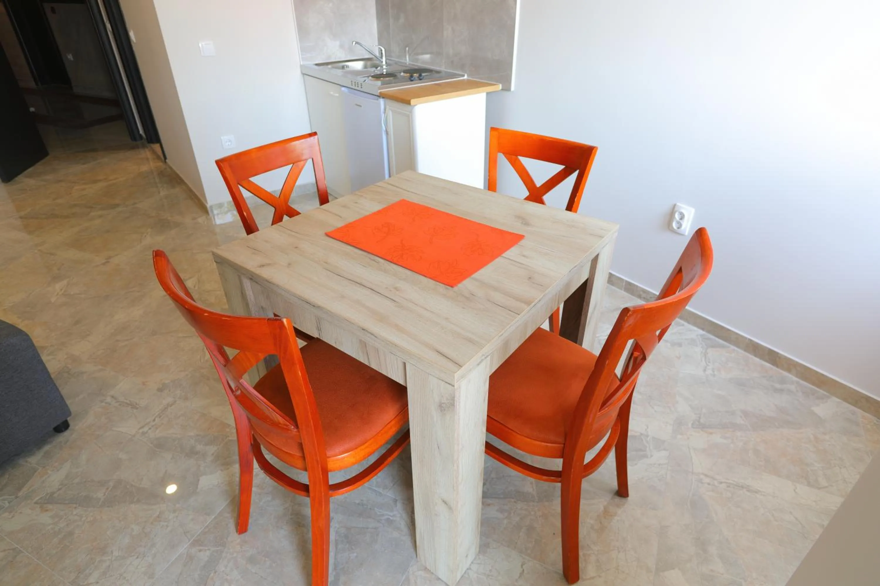 Kitchen or kitchenette in Fenix Apartments