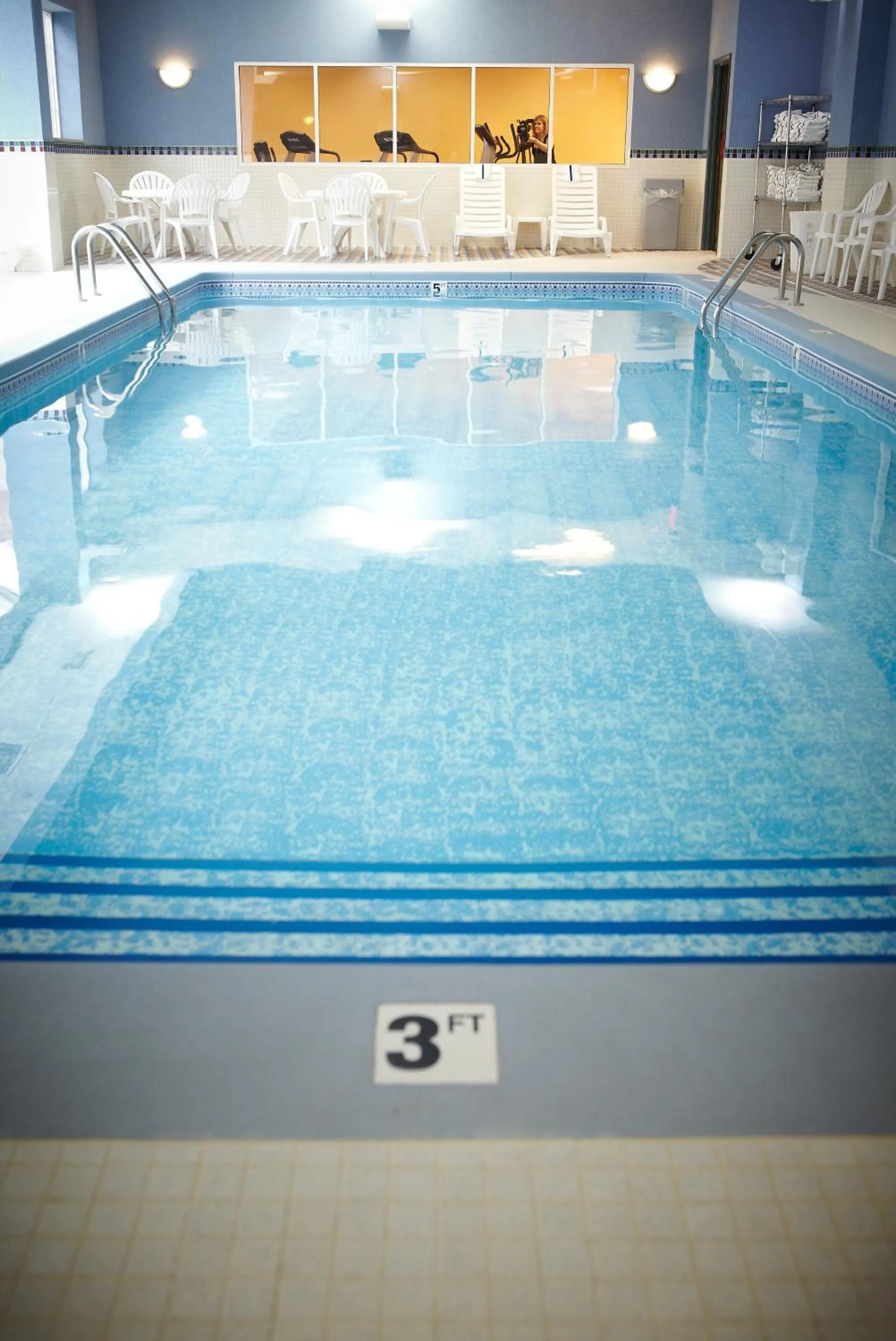 Swimming pool in Country Inn & Suites by Radisson, Grand Rapids East, MI