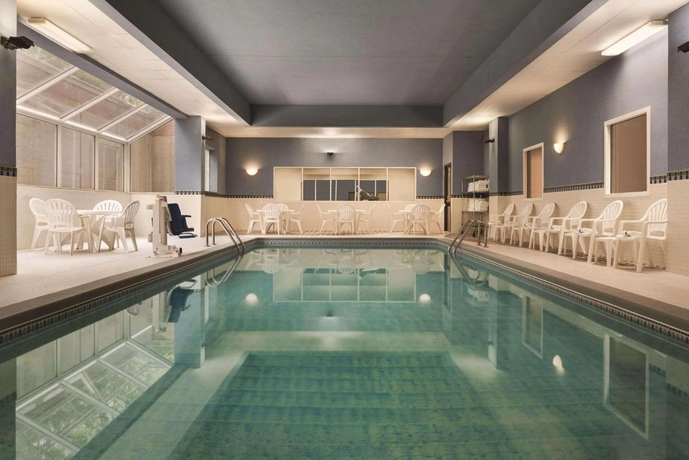 Swimming pool in Country Inn & Suites by Radisson, Grand Rapids East, MI